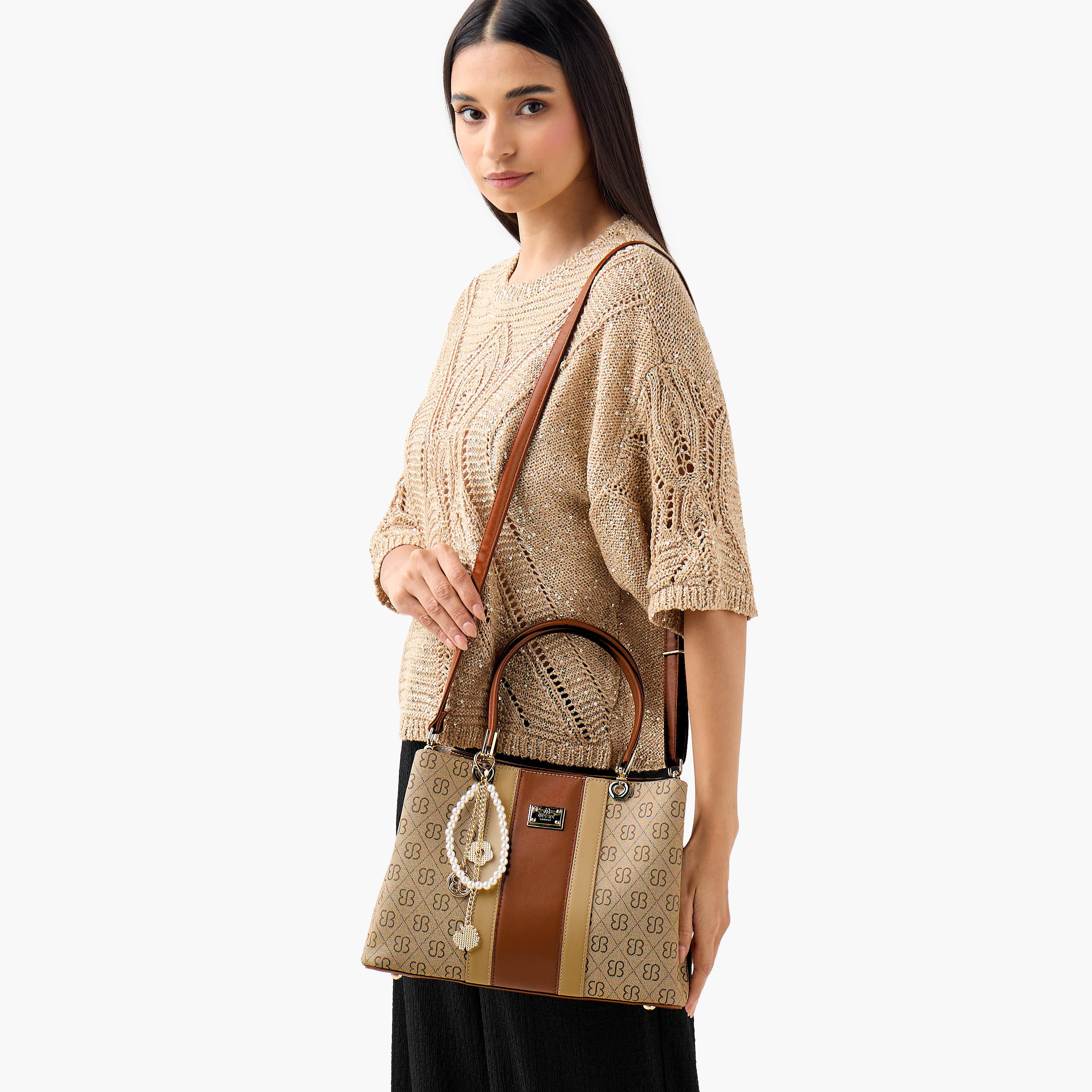 شنطة توتي بطبعات مونوجرام ودلاية من بيسي لندن-women-bagsandwallets-handbags-image-2