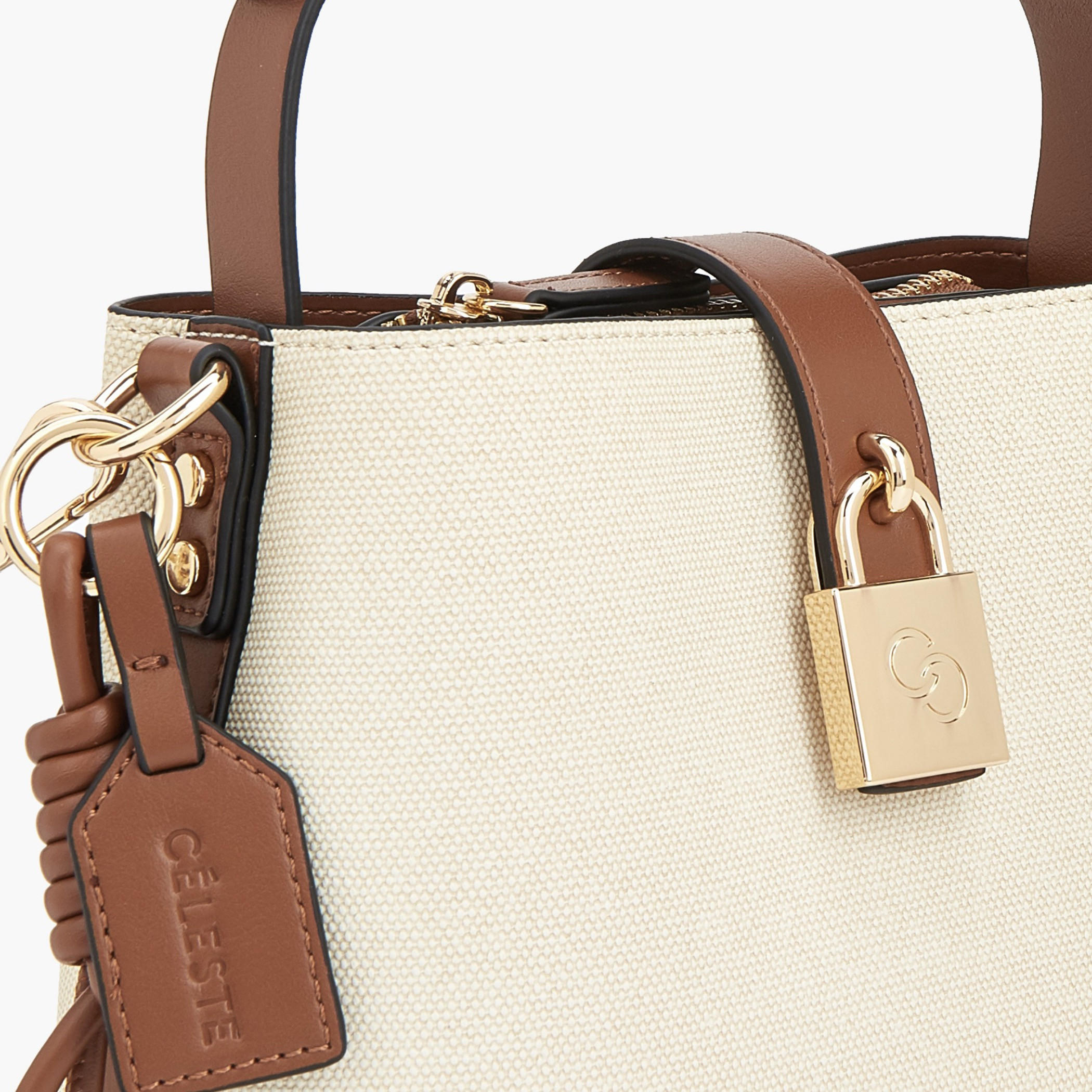 شنطة توتي بارزة الملمس بتفاصيل قفل من سيليست-women-bagsandwallets-handbags-image-5