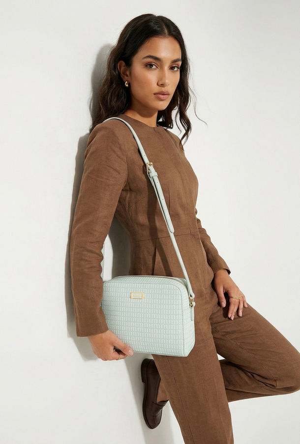 شنطة كروس بودي بطبعات مونوجرام مع حزام قابل للتعديل من ميسي-women-bagsandwallets-handbags-image-1