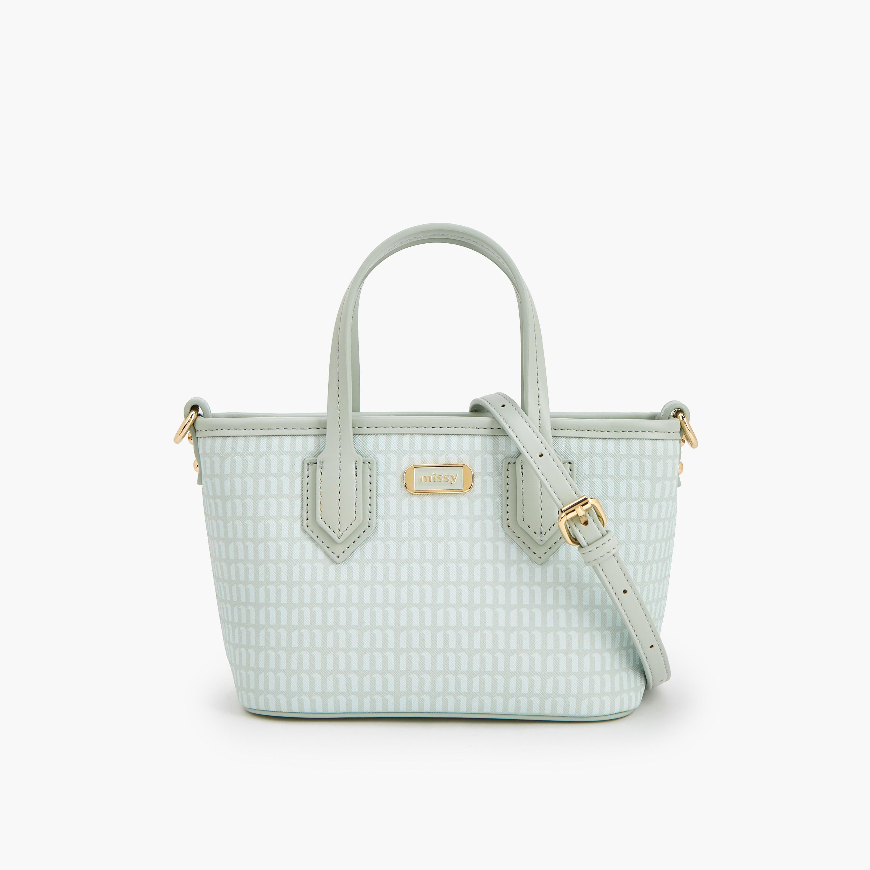 شنطة توتي بطبعات مونوجرام مع حزام قابل للفصل من ميسي-women-bagsandwallets-handbags-image-1