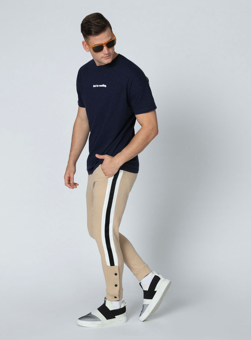 بنطال رياضي طويل بجيوب وأزرار من آيكونيك-men-clothing-bottoms-joggers-image-1