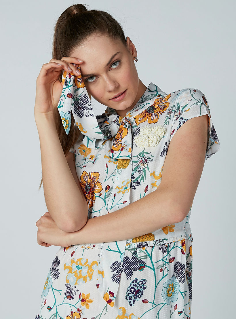 فستان طويل بحوّاف غير مستوية وأكمام كاب وطبعات زهرية من آيكونيك-women-clothing-dresses-image-1