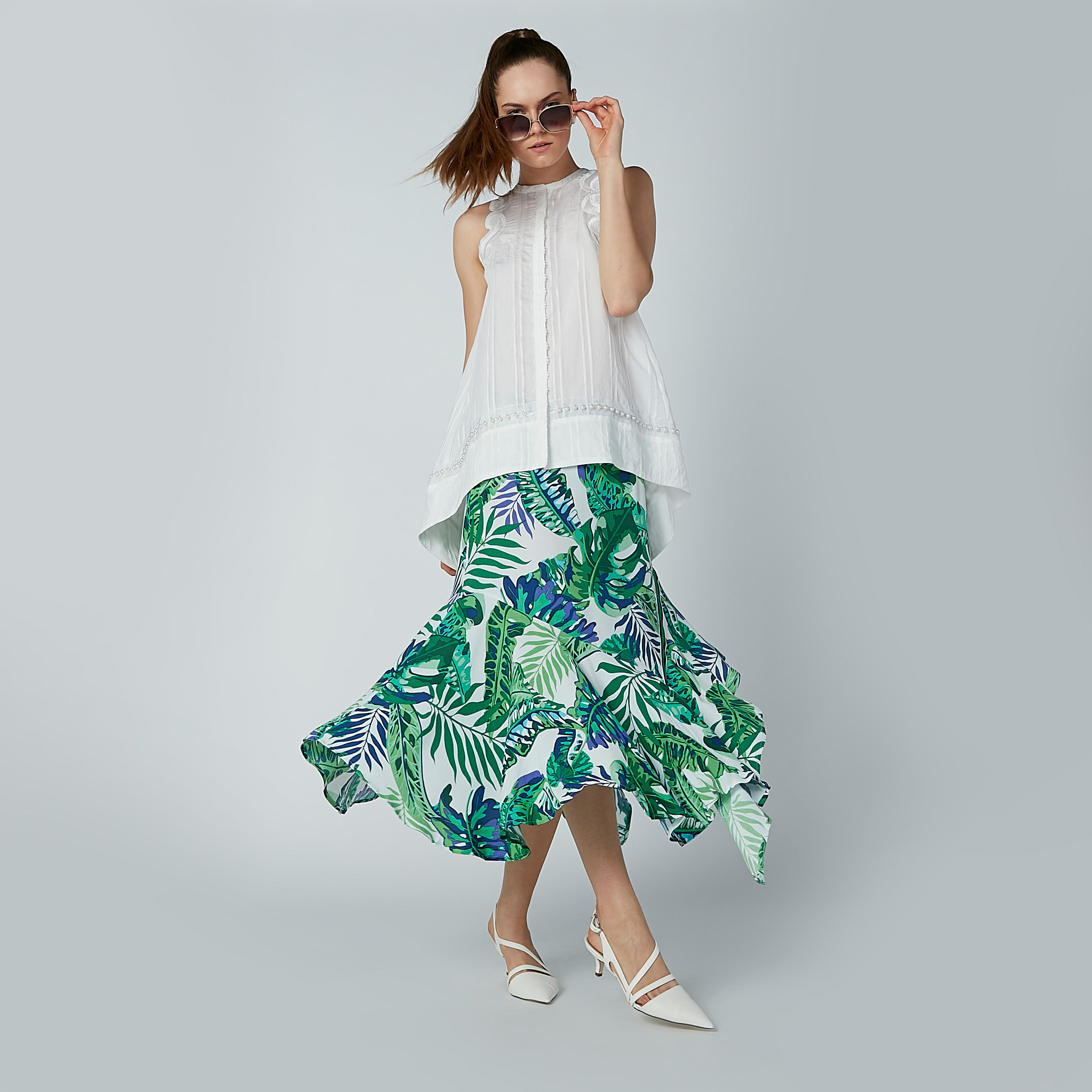 تنورة متوسطة الطول بحوّاف غير مستوية وطبعات زهرية من آيكونيك-women-clothing-bottoms-skirts-image-1