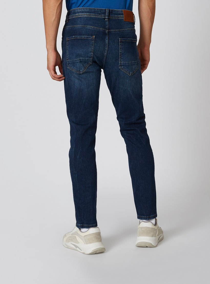 بنطلون جينز ممزّق بقصّة سليم وخصر متوسط الارتفاع وجيوب من آيكونيك-men-clothing-bottoms-jeans-image-2