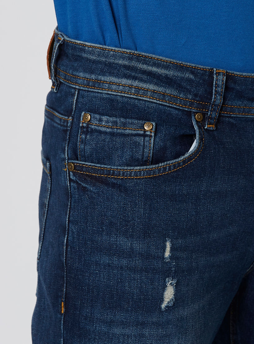 بنطلون جينز ممزّق بقصّة سليم وخصر متوسط الارتفاع وجيوب من آيكونيك-men-clothing-bottoms-jeans-image-5