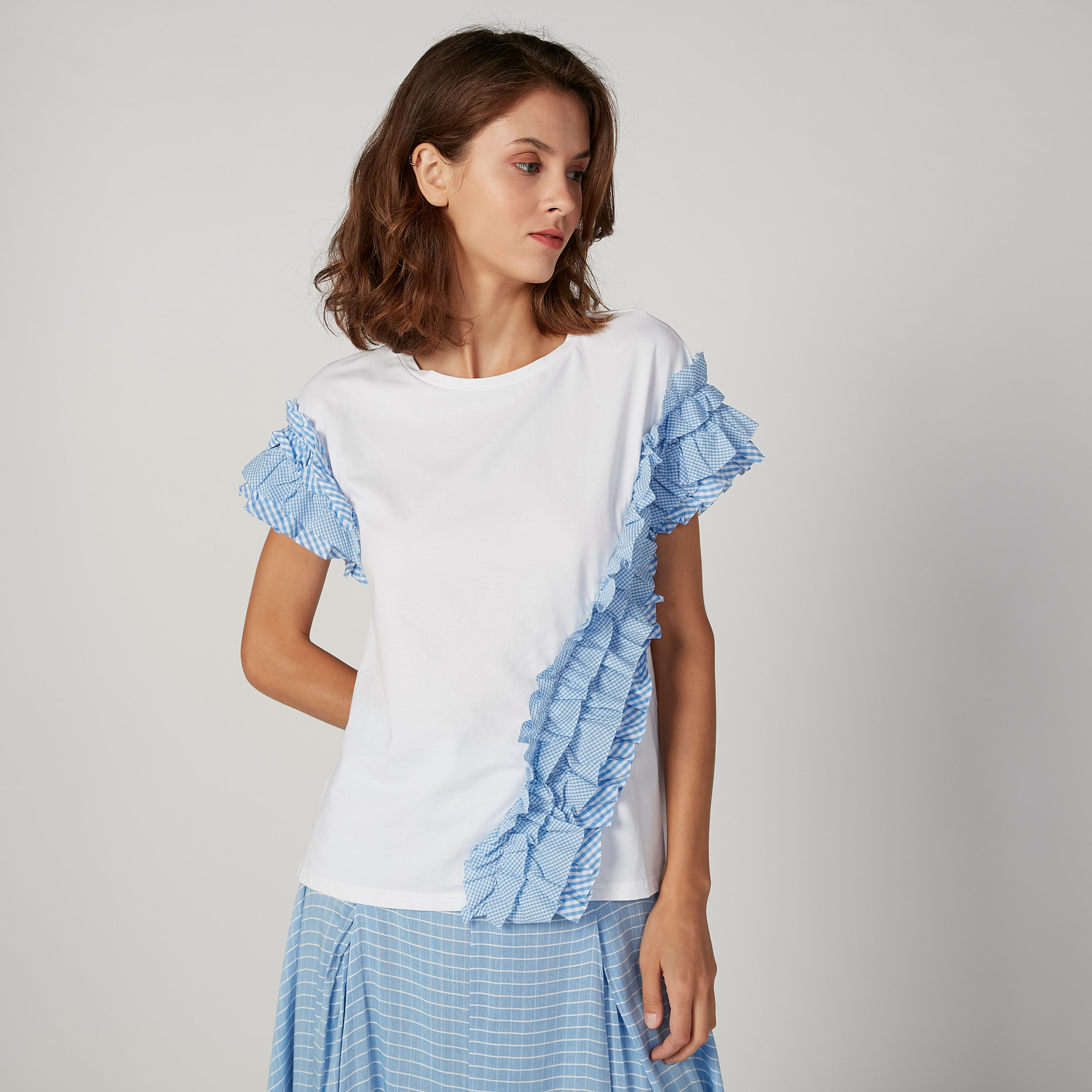 بلوزة سكيني كاروهات بياقة مستديرة وتفاصيل كشكش من آيكونيك-women-clothing-tshirts-image-1