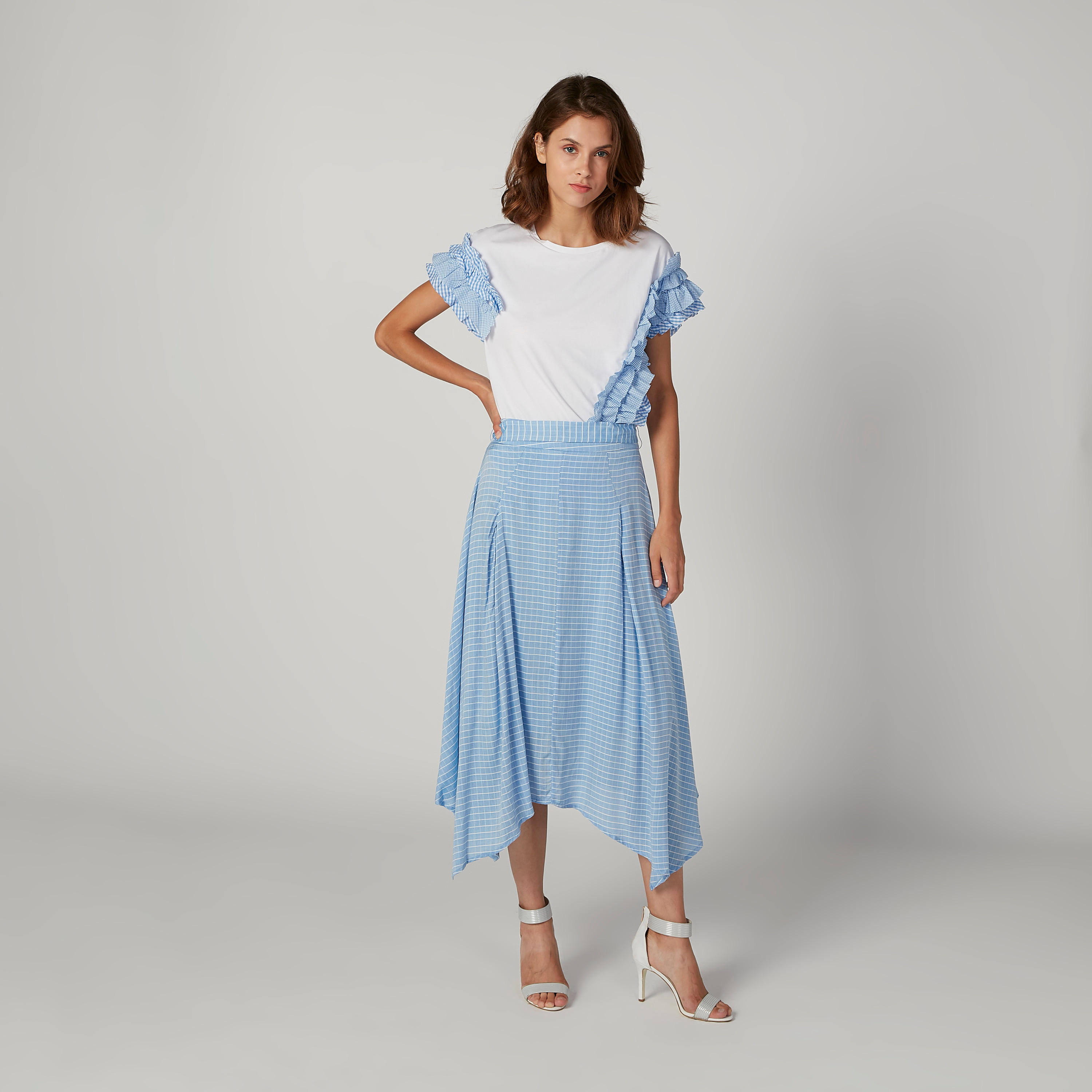 بلوزة سكيني كاروهات بياقة مستديرة وتفاصيل كشكش من آيكونيك-women-clothing-tshirts-image-2