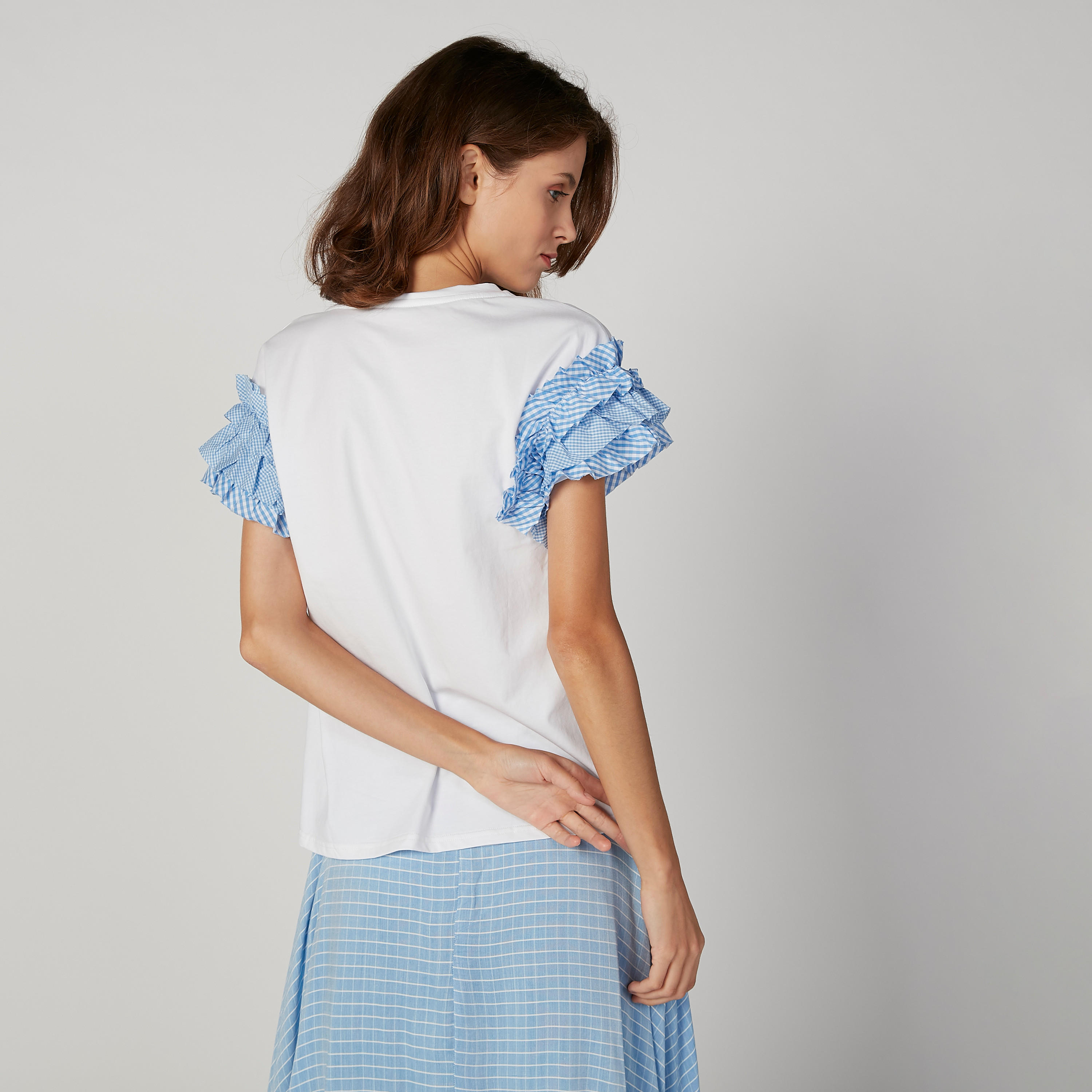 بلوزة سكيني كاروهات بياقة مستديرة وتفاصيل كشكش من آيكونيك-women-clothing-tshirts-image-4
