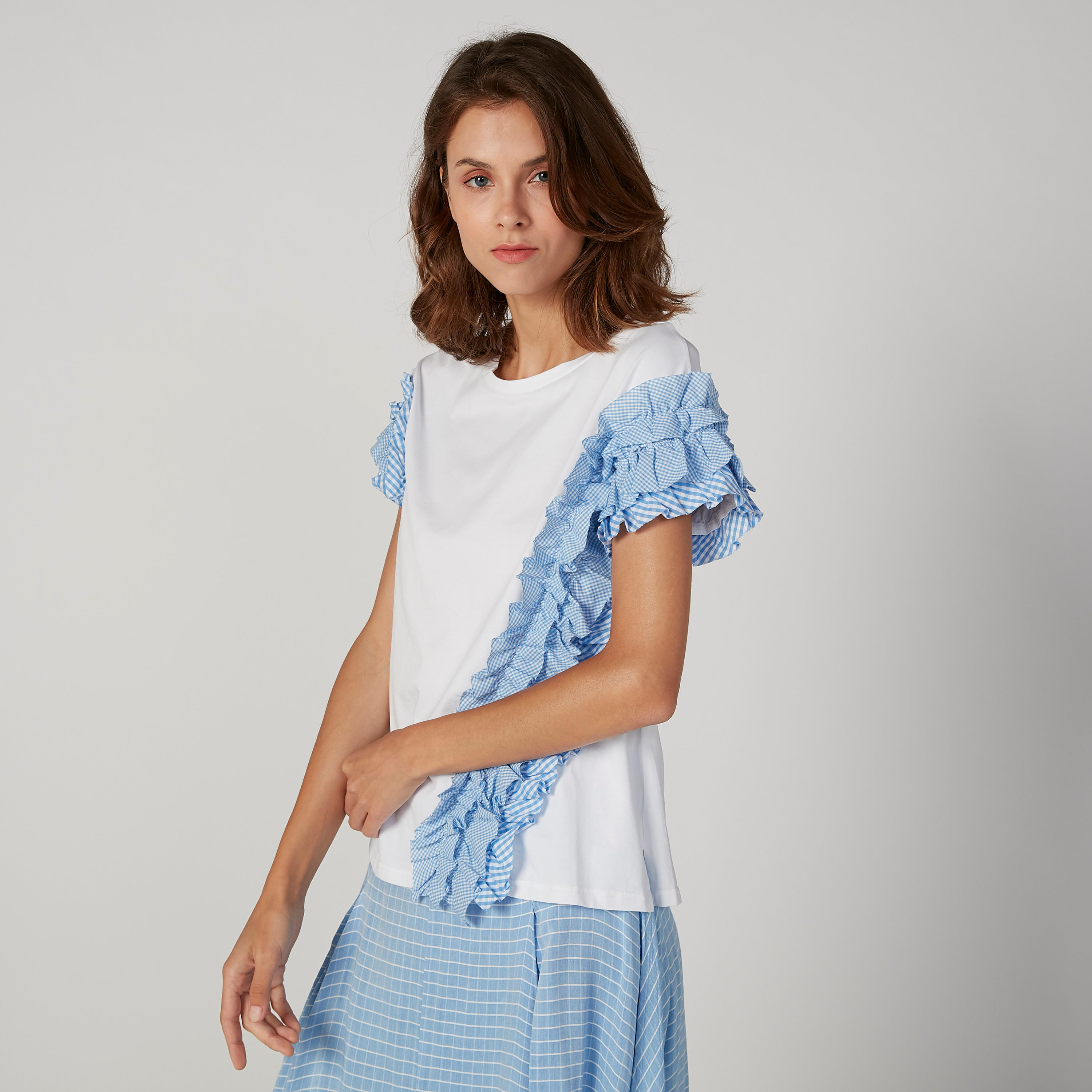 بلوزة سكيني كاروهات بياقة مستديرة وتفاصيل كشكش من آيكونيك-women-clothing-tshirts-image-5