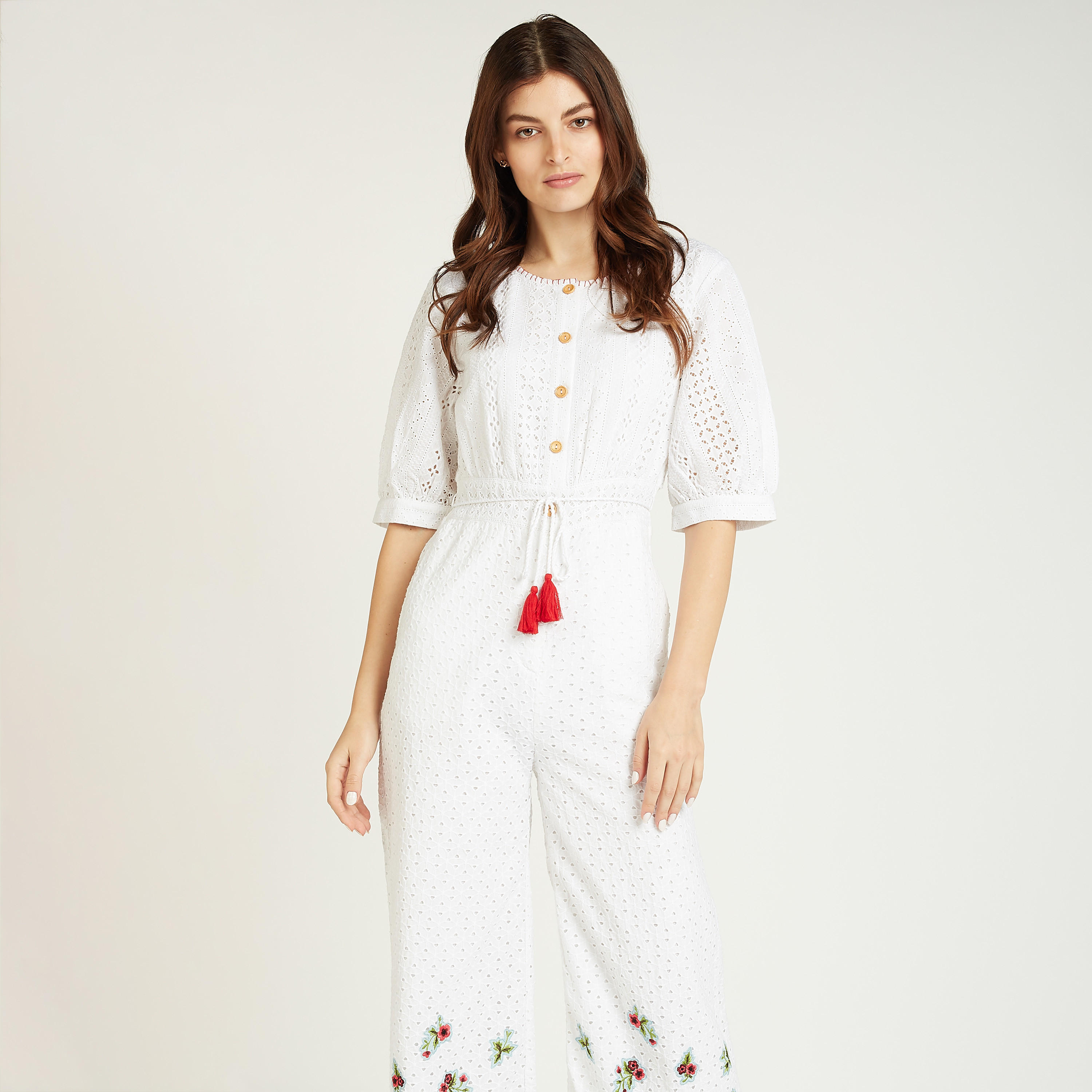 أفرول بارز الملمس بأكمام قصيرة وتفاصيل شيفلي من آيكونيك-women-clothing-jumpsuits-image-2