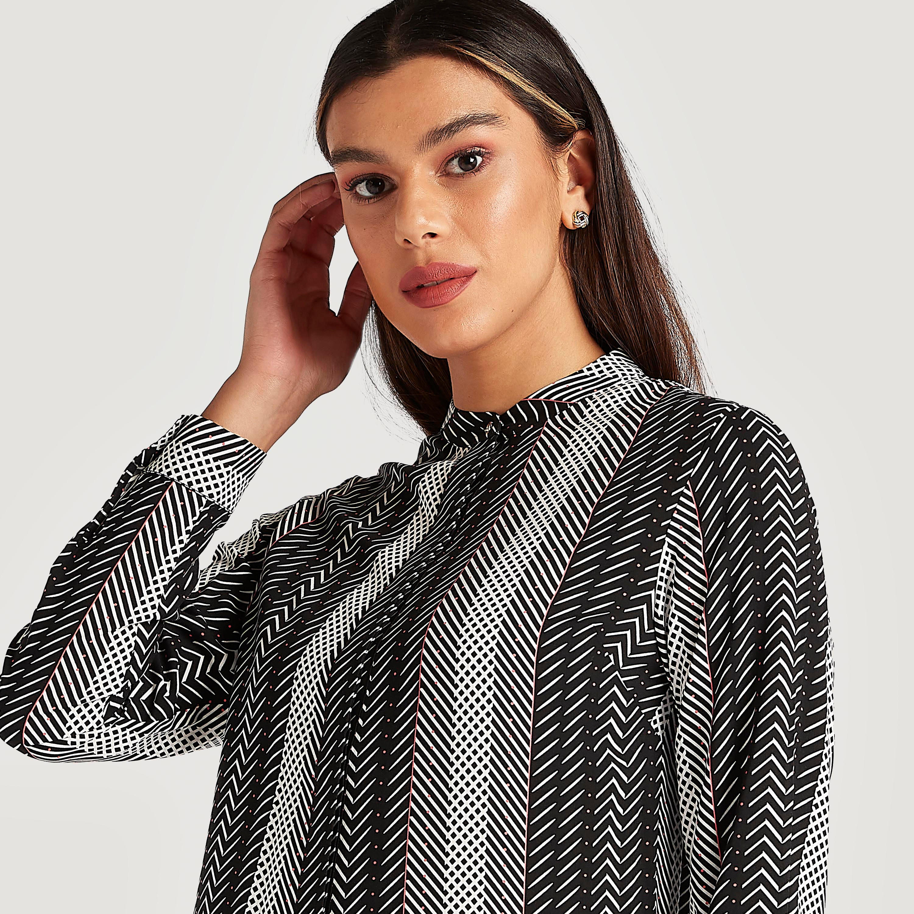 بلوزة طويلة بأكمام طويلة وطبعات من آيكونيك-women-clothing-shirtsandblouses-blouses-image-6