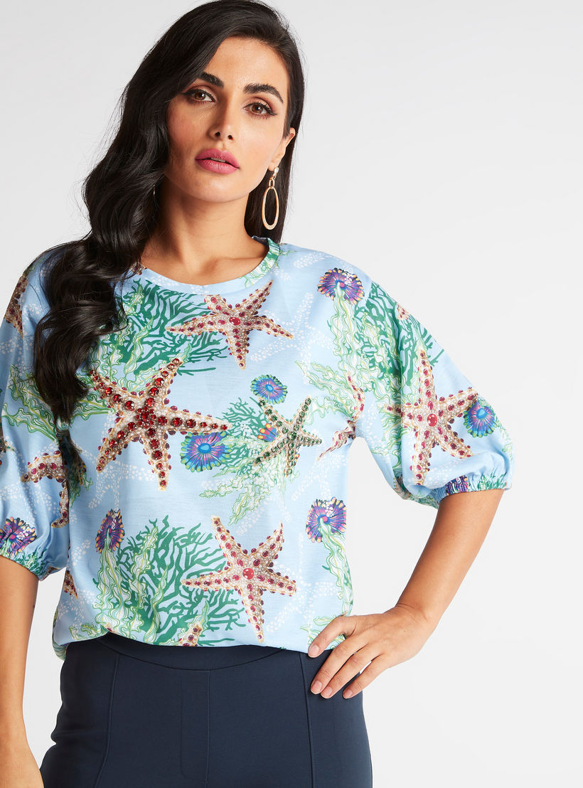 بلوزة بياقة مستديرة وأكمام قصيرة وطبعات نجمة البحر من آيكونيك-women-clothing-shirtsandblouses-blouses-image-1
