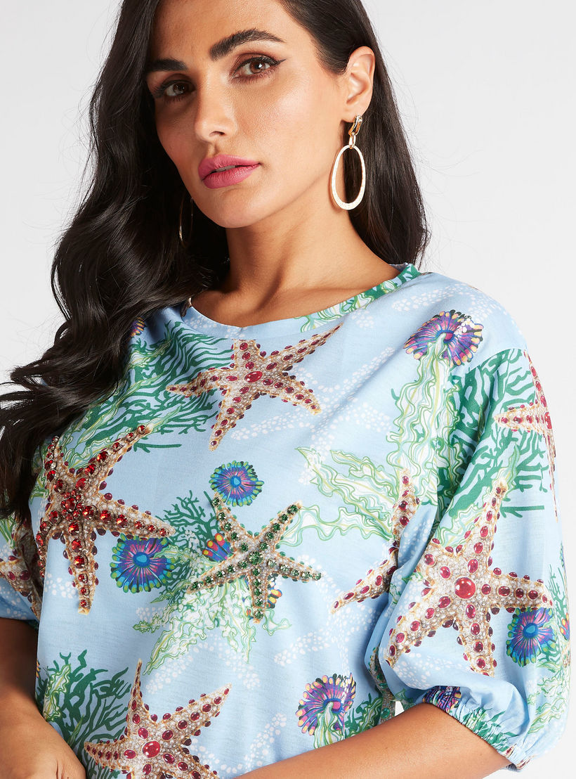 بلوزة بياقة مستديرة وأكمام قصيرة وطبعات نجمة البحر من آيكونيك-women-clothing-shirtsandblouses-blouses-image-3