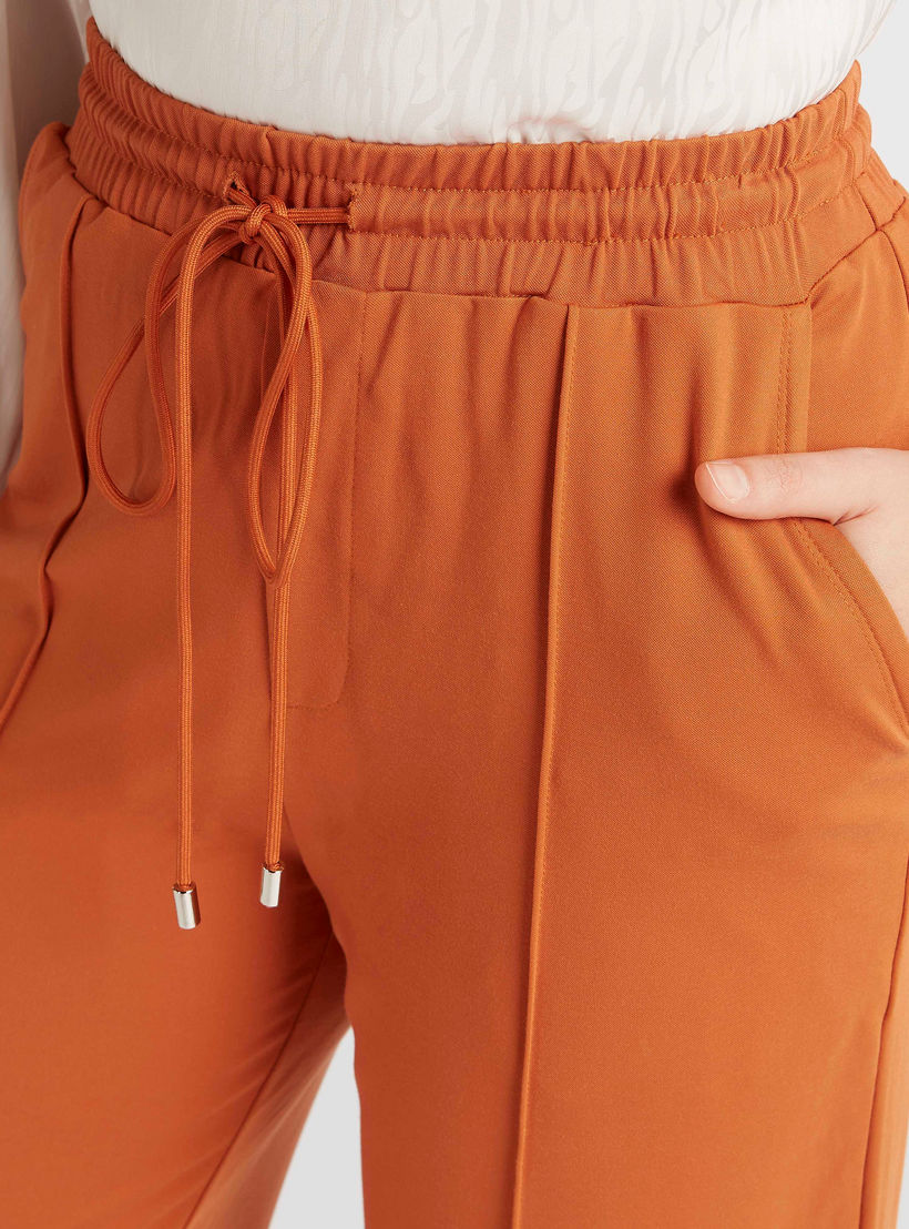 Iconic Solid Mid-Rise Pants with Drawstring Closure and Pockets-women-clothing-bottoms-trousers-image-3