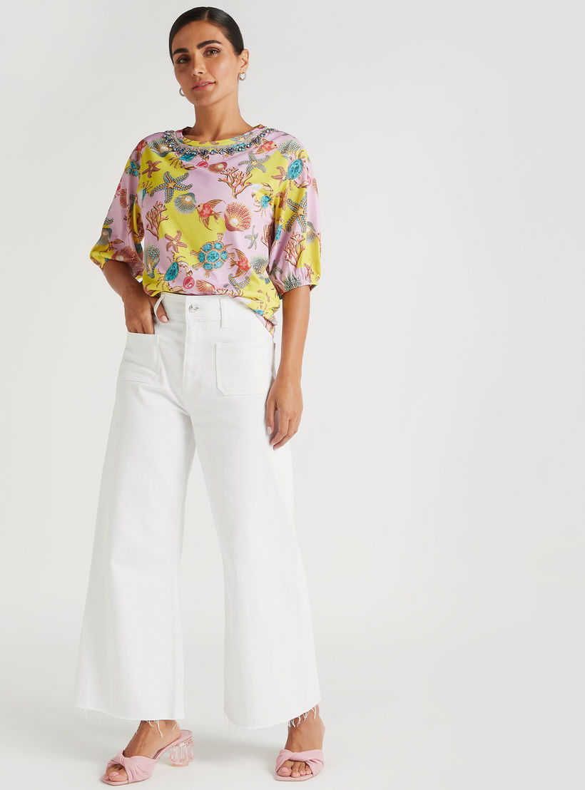 بلوزة بياقة ضيّقة وتزيينات وطبعات نجمة البحر من آيكونيك-women-clothing-shirtsandblouses-blouses-image-2