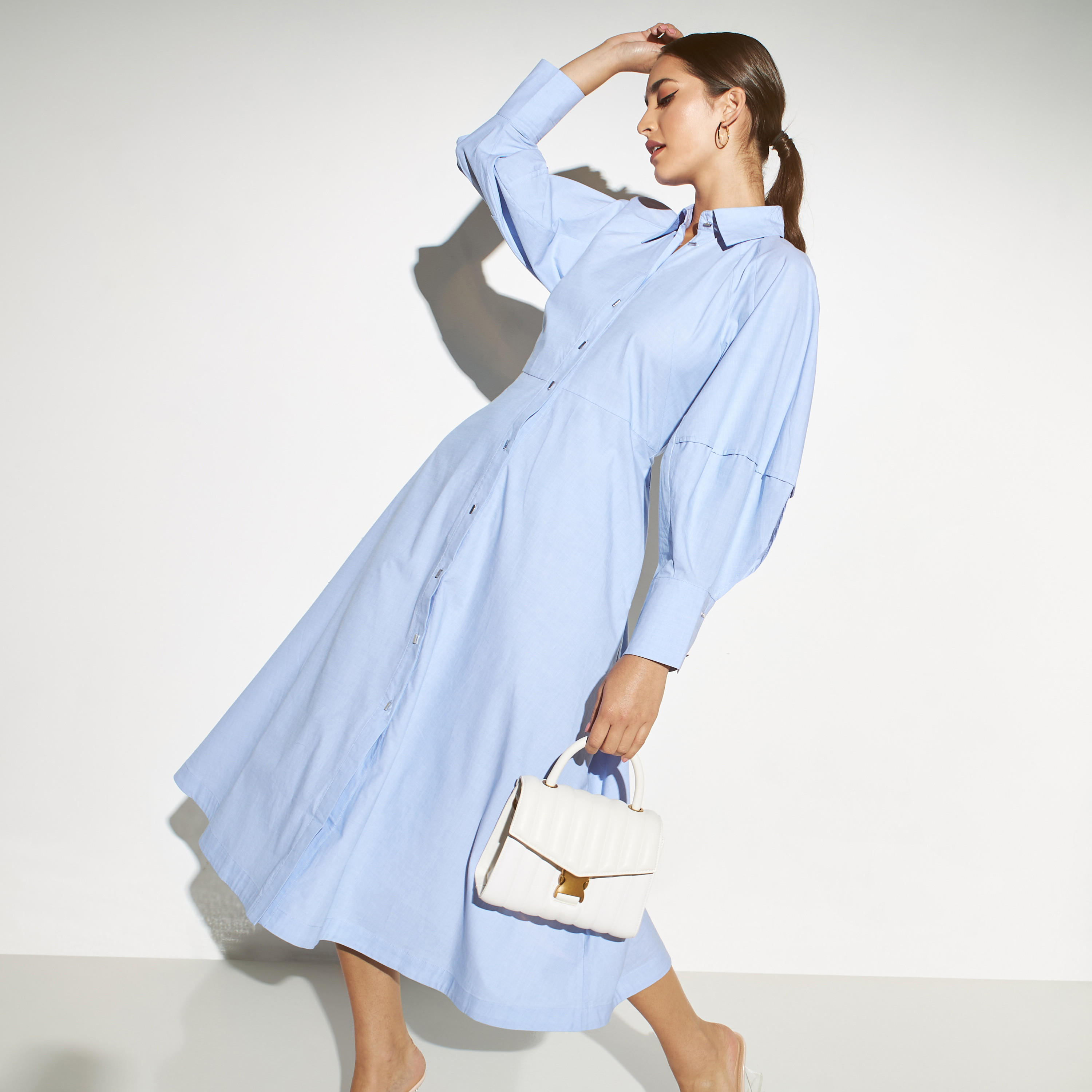 قميص سادة بزر إغلاق بأكمام كبيرة من آيكونك-women-clothing-dresses-image-1