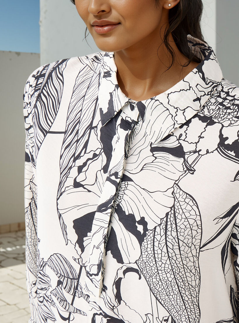 فستان ماكسي فضفاض بياقة عادية وأكمام طويلة وطبعات من آيكونيك-women-clothing-dresses-image-4