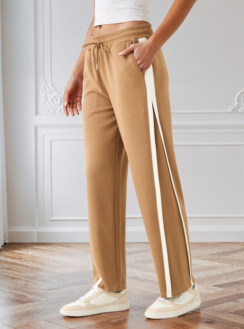 بنطلون بقصة مريحة وخصر مرن وزينة شريط من آيكونيك-women-clothing-bottoms-trousers-image-1