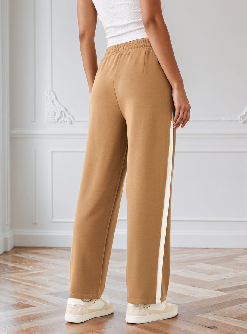 بنطلون بقصة مريحة وخصر مرن وزينة شريط من آيكونيك-women-clothing-bottoms-trousers-image-3