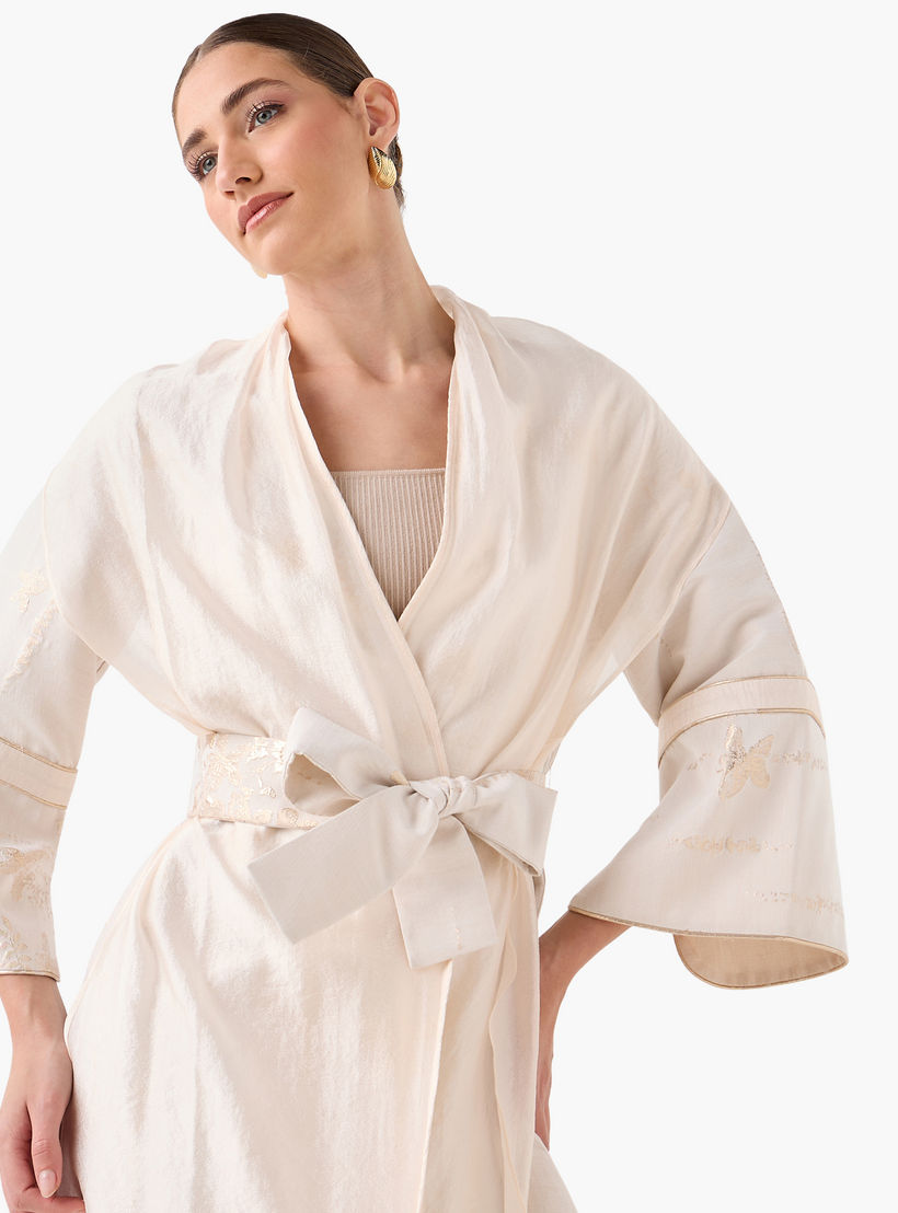 سترة جاكار بقصة مريحة وحزام رباط من آيكونيك-women-clothing-shirtsandblouses-blouses-image-5