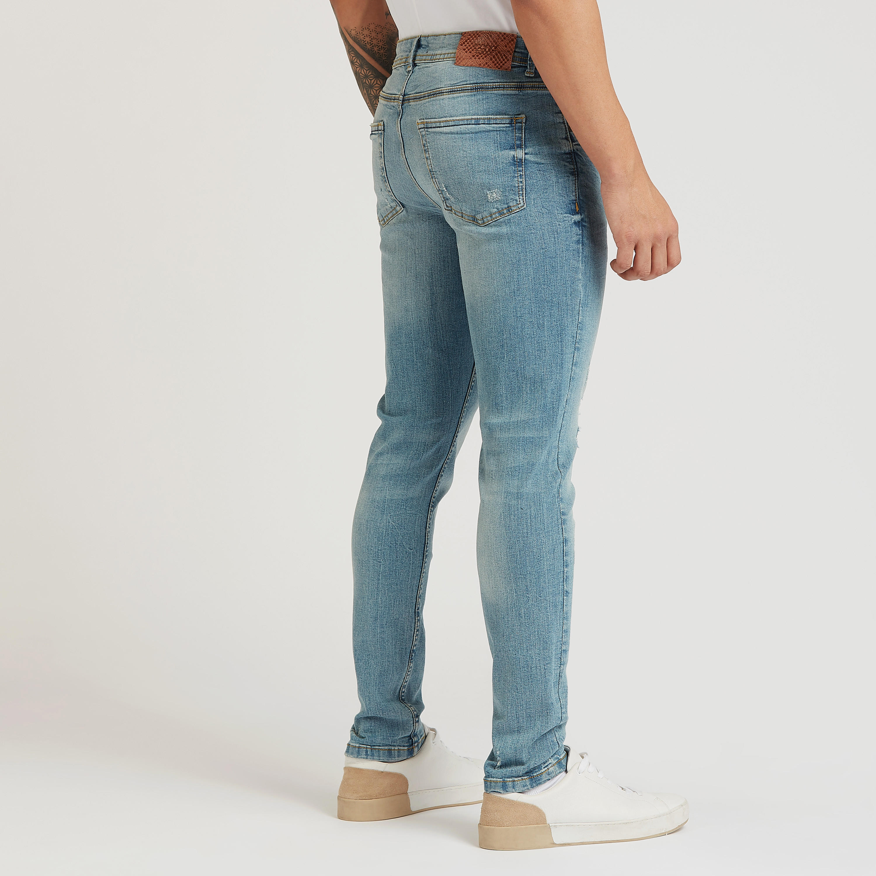 بنطلون جينز ممزّق بقصّة سليم وخصر متوسط الارتفاع وجيوب من آيكونيك-men-clothing-bottoms-jeans-image-4