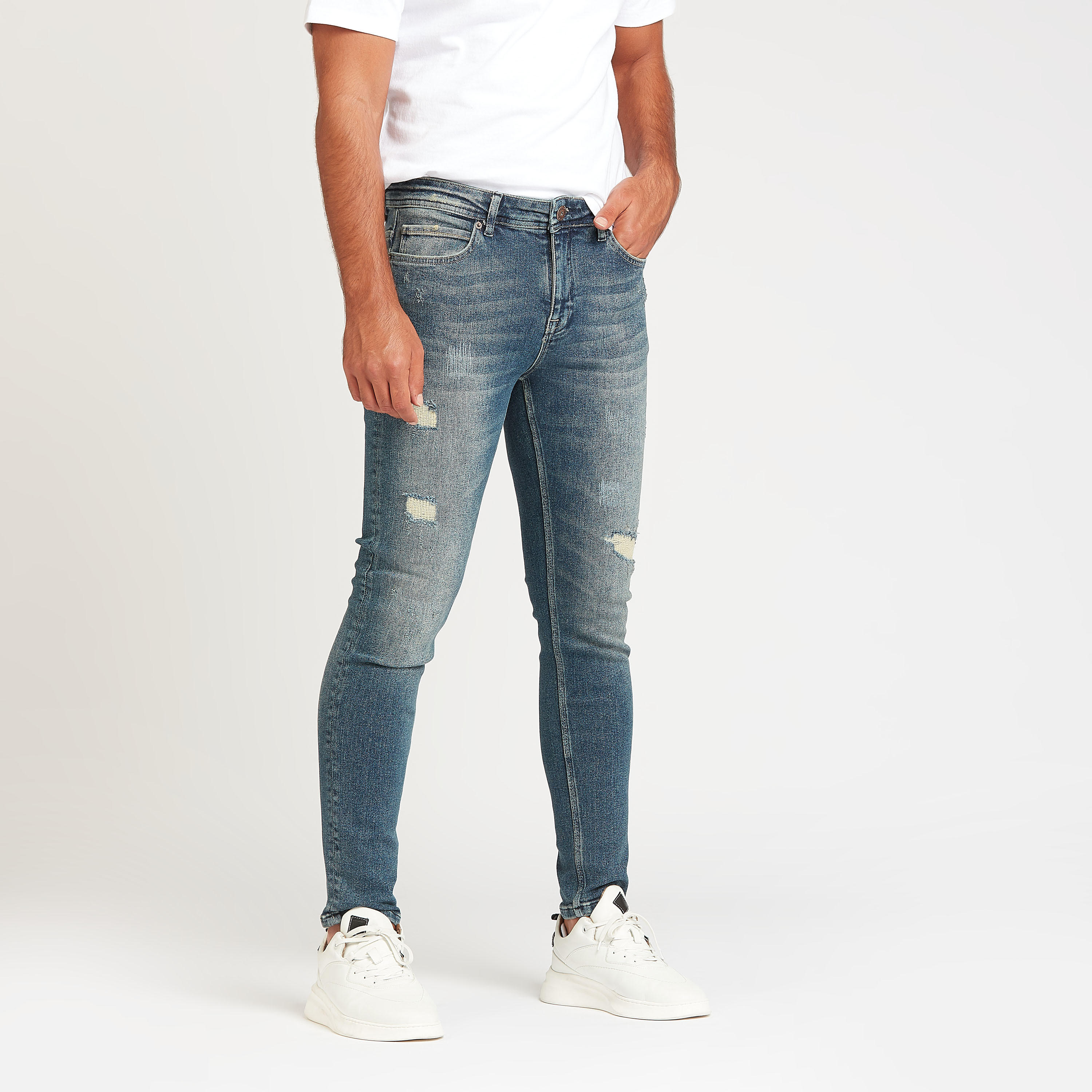 بنطلون جينز ممزّق بقصّة سليم وخصر متوسط الارتفاع وجيوب من آيكونيك-men-clothing-bottoms-jeans-image-1