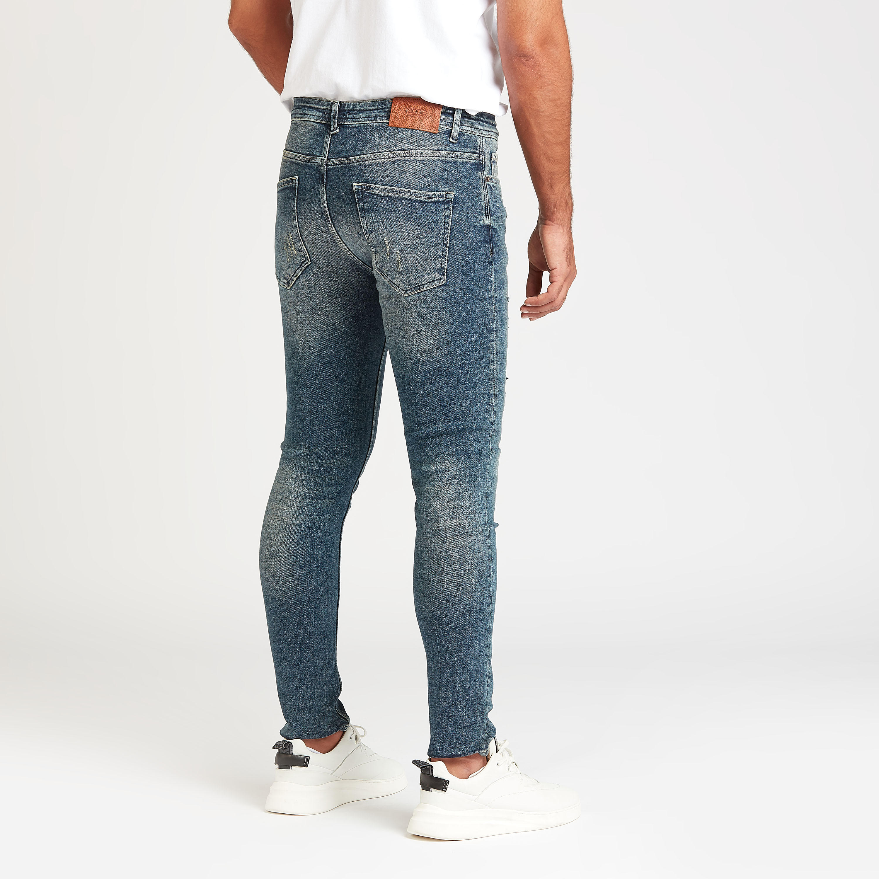 بنطلون جينز ممزّق بقصّة سليم وخصر متوسط الارتفاع وجيوب من آيكونيك-men-clothing-bottoms-jeans-image-4
