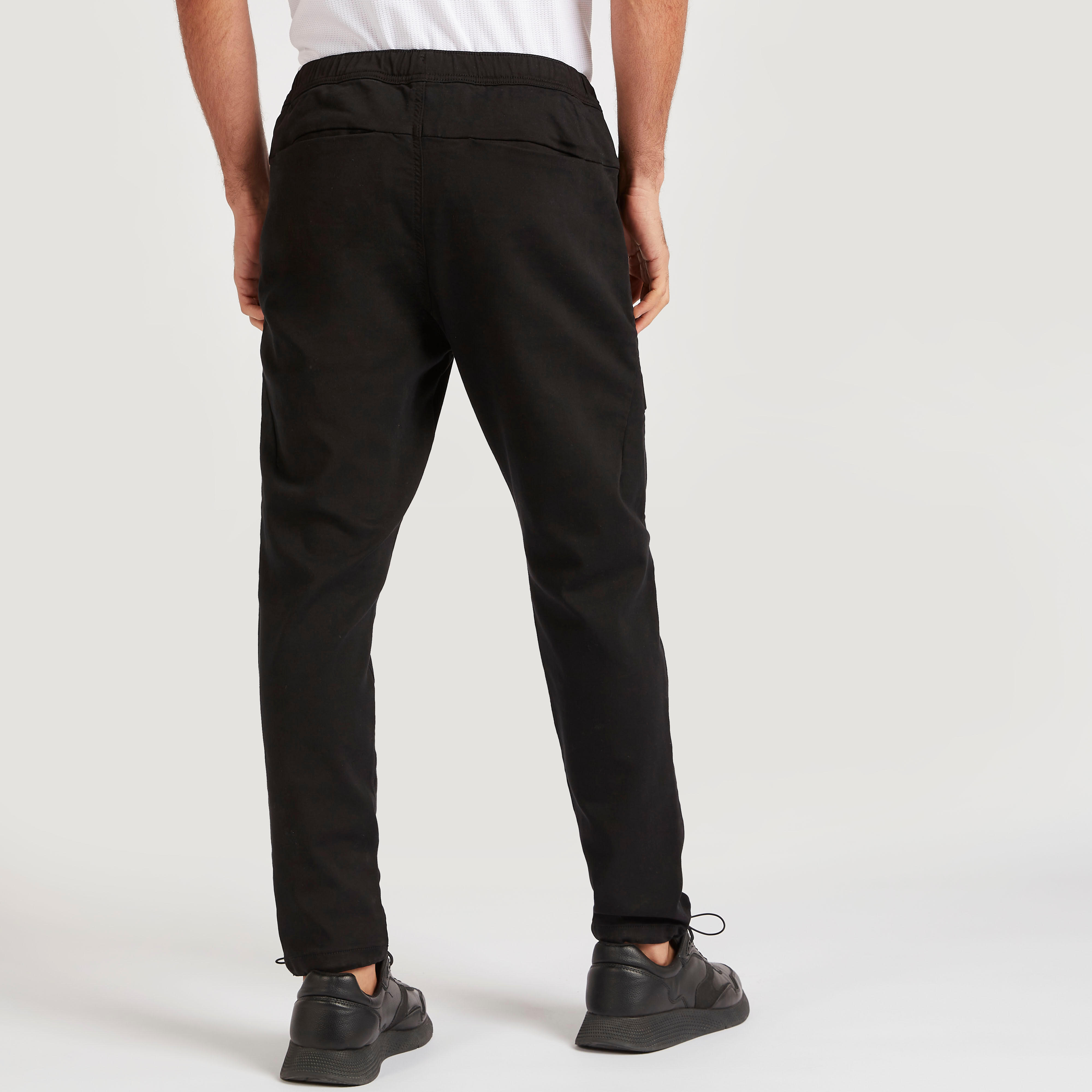 Solid Slim Fit Trousers with Elasticated Waistband-men-clothing-bottoms-trousersandchinos-trousers-image-4