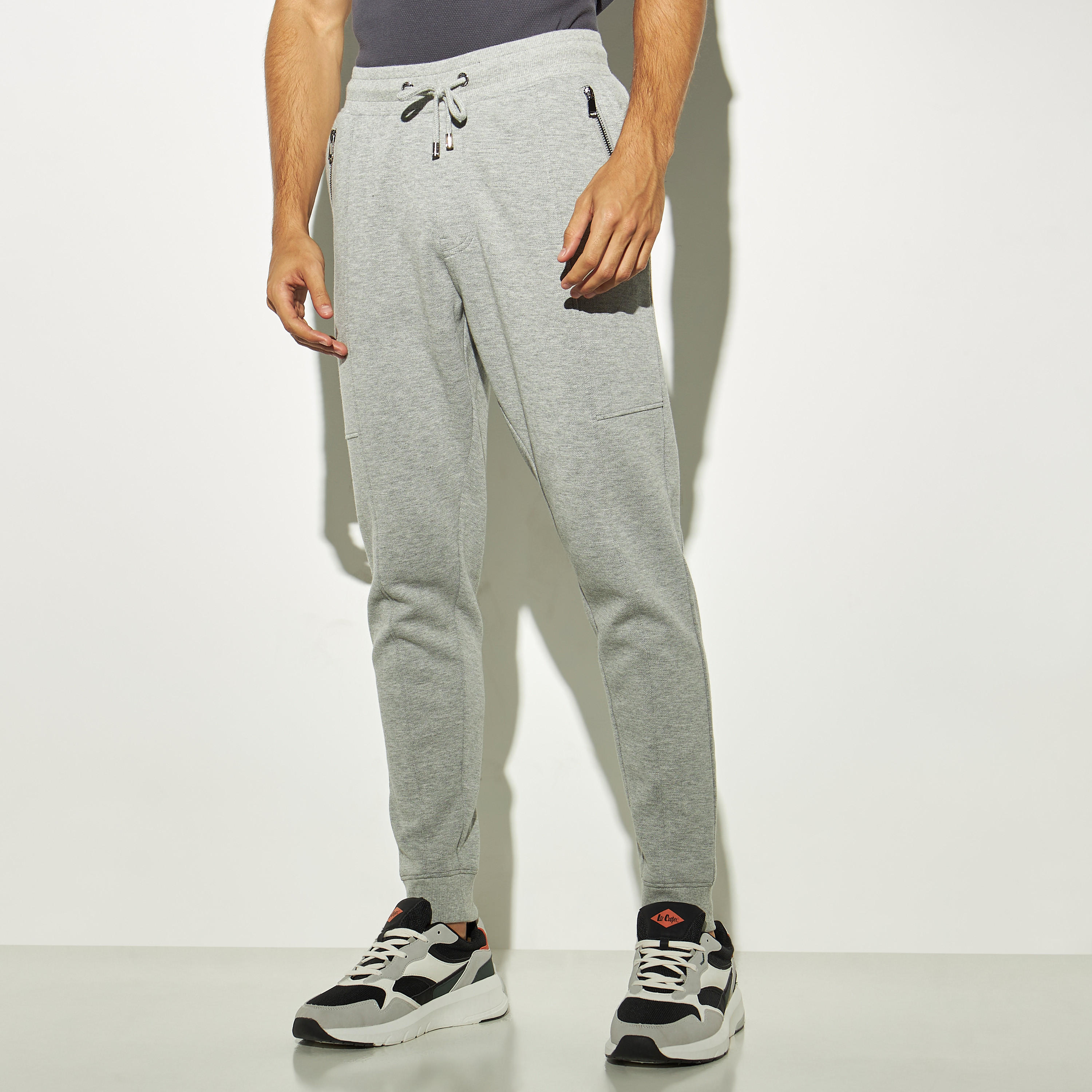 Iconic Solid Joggers with Zippered Pockets and Drawstring Closure-men-clothing-bottoms-joggers-image-1