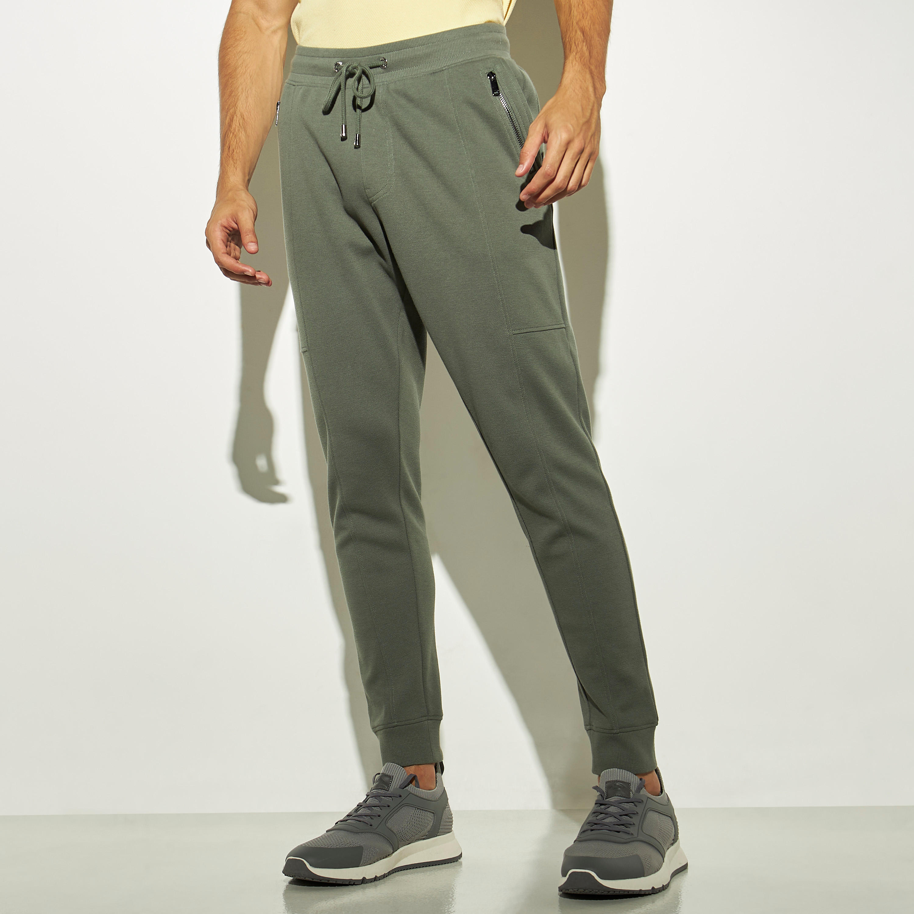 Iconic Solid Joggers with Zippered Pockets and Drawstring Closure-men-clothing-bottoms-joggers-image-1
