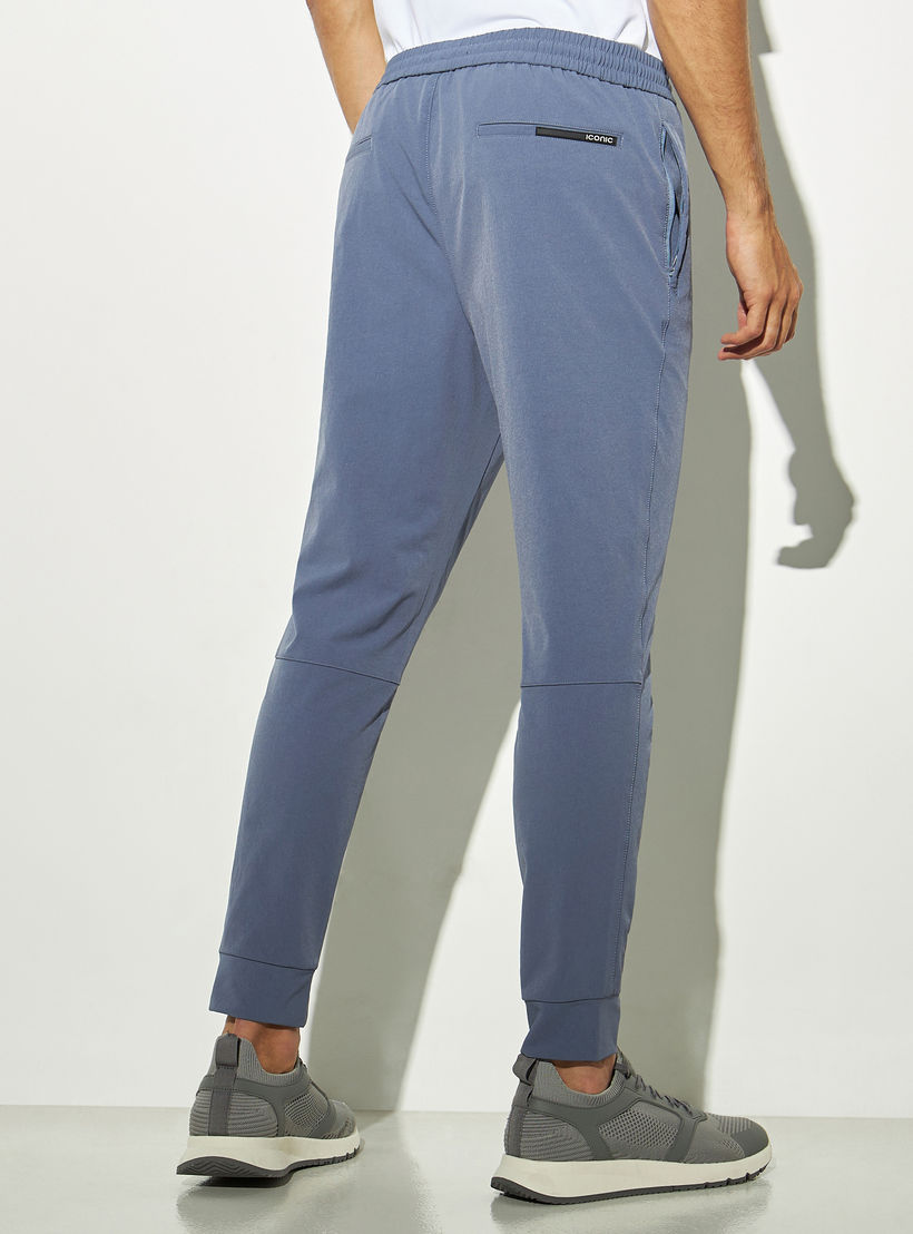 بنطلون رياضي سادة برباط إغلاق وجيوب بسحاب من آيكونيك-men-clothing-bottoms-joggers-image-2