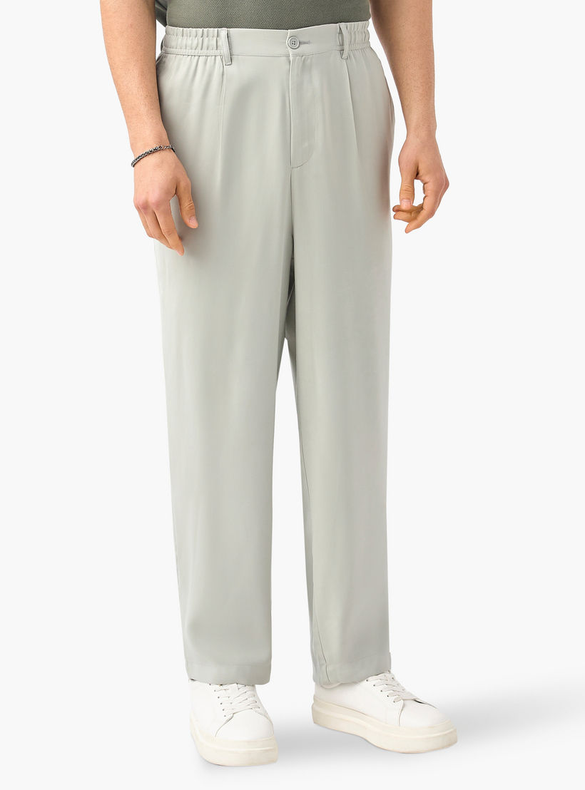 بنطلون بخصر مرن وكسرات وجيوب وزر إغلاق من آيكونيك-men-clothing-bottoms-trousersandchinos-trousers-image-1