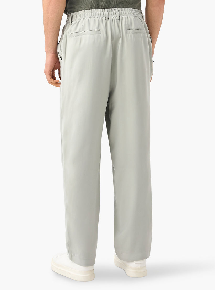 بنطلون بخصر مرن وكسرات وجيوب وزر إغلاق من آيكونيك-men-clothing-bottoms-trousersandchinos-trousers-image-3