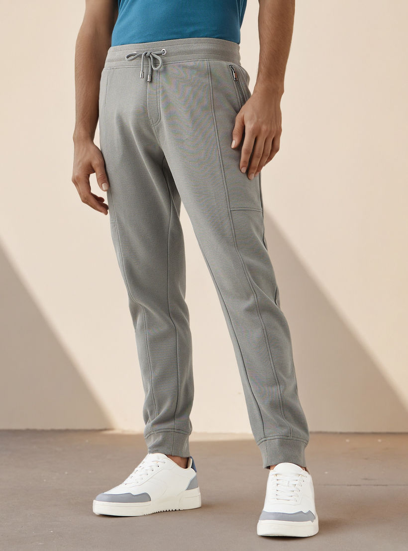 بنطلون رياضي بخصر مطاطي وجيوب من أيكونيك-men-clothing-bottoms-joggers-image-1