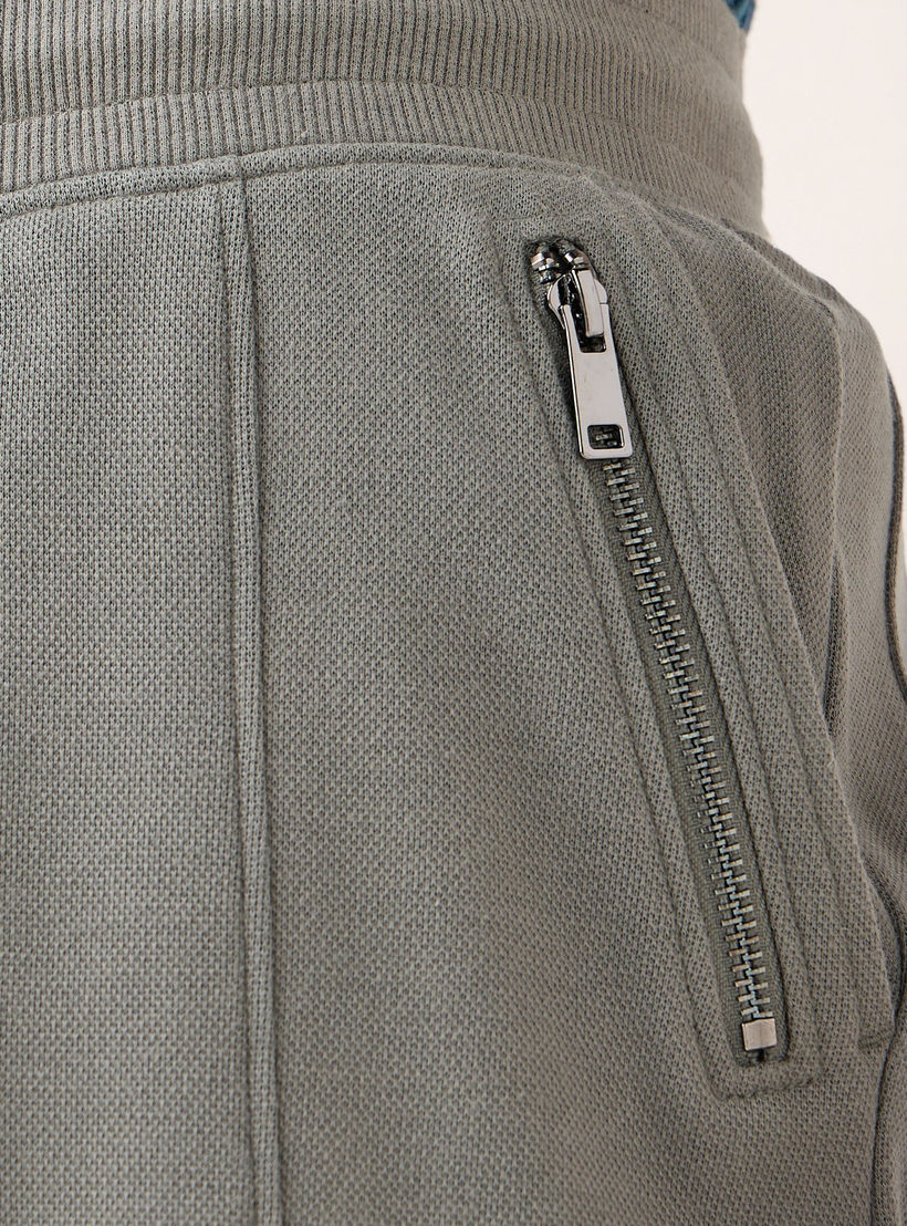 بنطلون رياضي بخصر مطاطي وجيوب من أيكونيك-men-clothing-bottoms-joggers-image-5