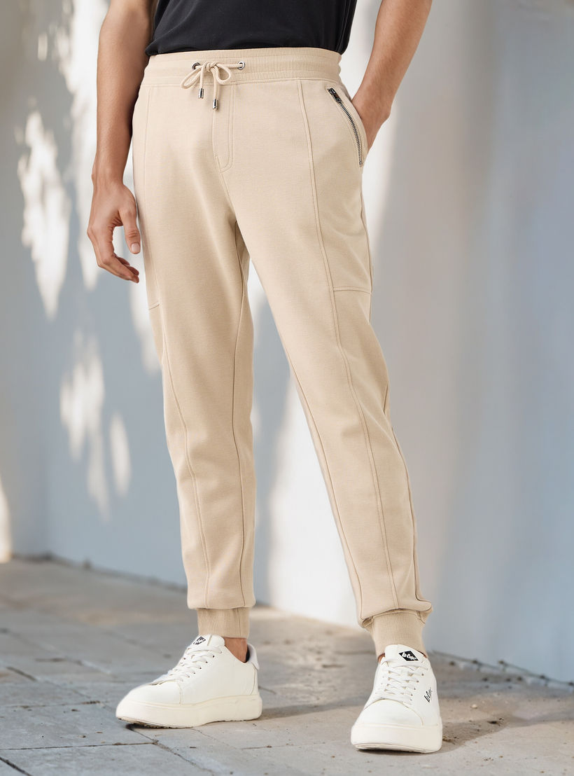 بنطلون رياضي بخصر مطاطي وجيوب من أيكونيك-men-clothing-bottoms-joggers-image-1