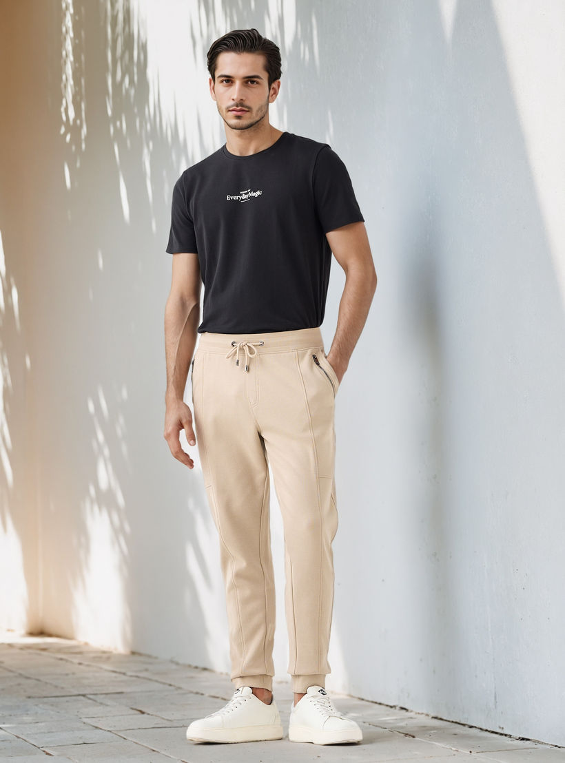 بنطلون رياضي بخصر مطاطي وجيوب من أيكونيك-men-clothing-bottoms-joggers-image-2
