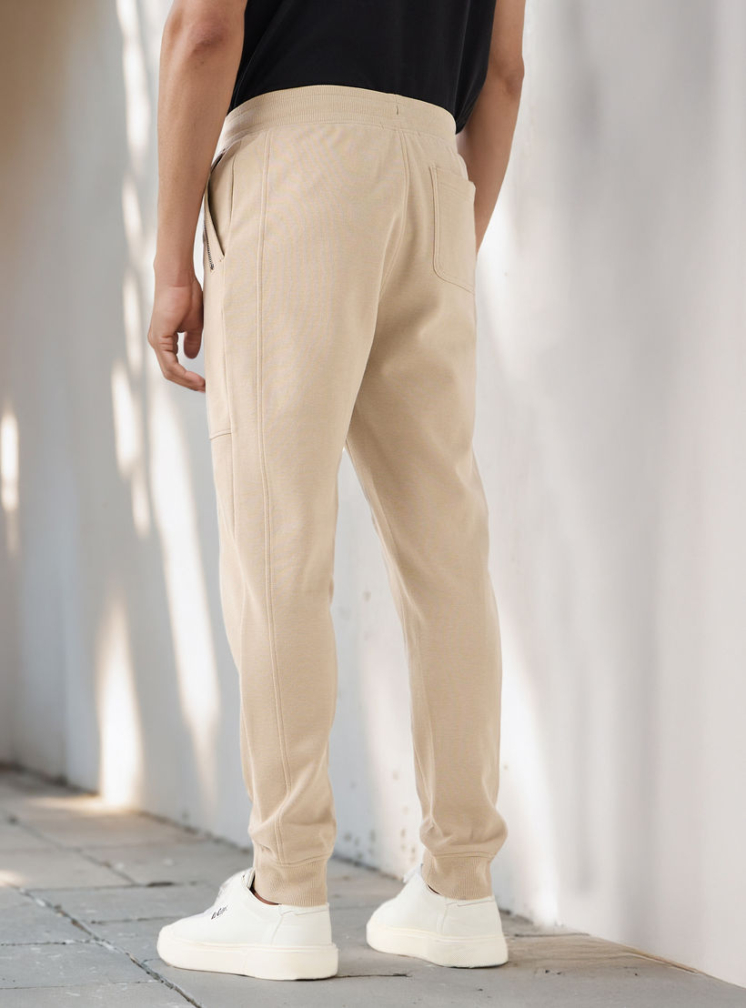 بنطلون رياضي بخصر مطاطي وجيوب من أيكونيك-men-clothing-bottoms-joggers-image-3