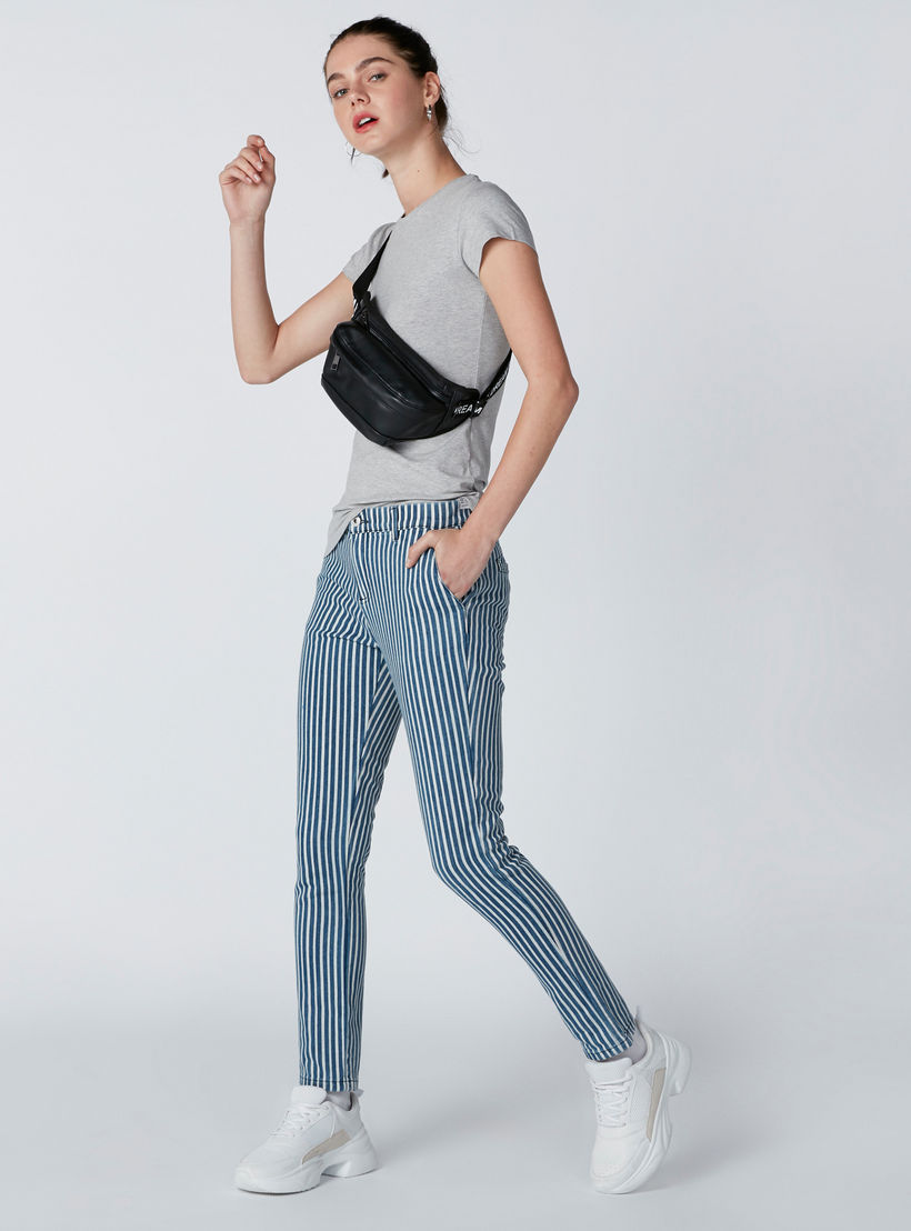 جينز مخطّط بقصّة سكيني وخصر مرتفع وتفاصيل جيوب-women-clothing-bottoms-jeans-image-1