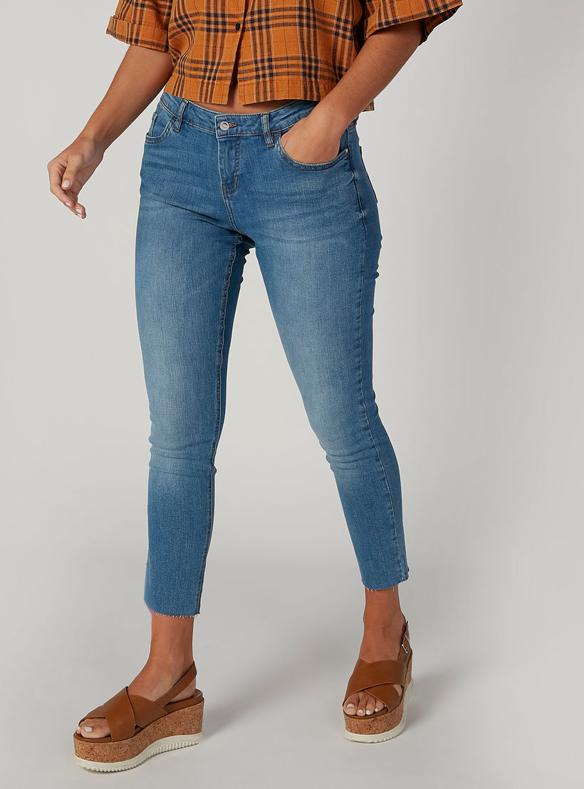 بنطلون جينز مستدام سكيني ممزّق بخصر متوسط الارتفاع وجيوب-women-clothing-bottoms-jeans-image-1