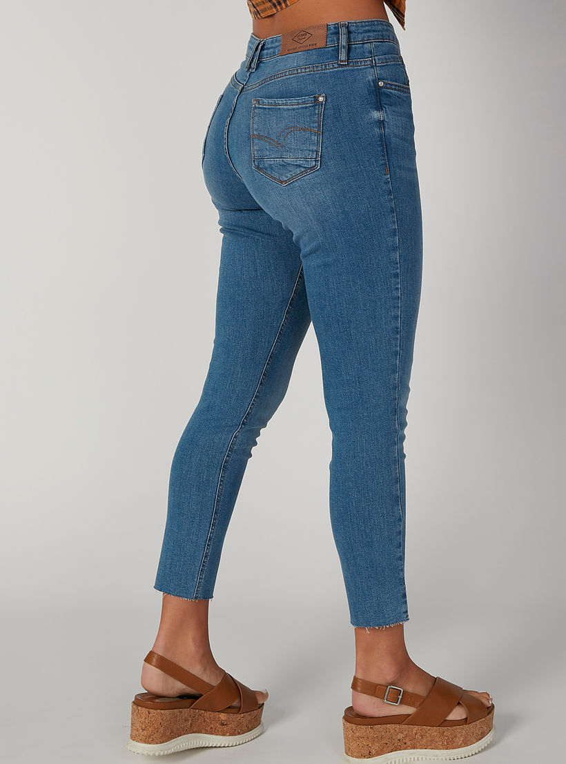 بنطلون جينز مستدام سكيني ممزّق بخصر متوسط الارتفاع وجيوب-women-clothing-bottoms-jeans-image-2
