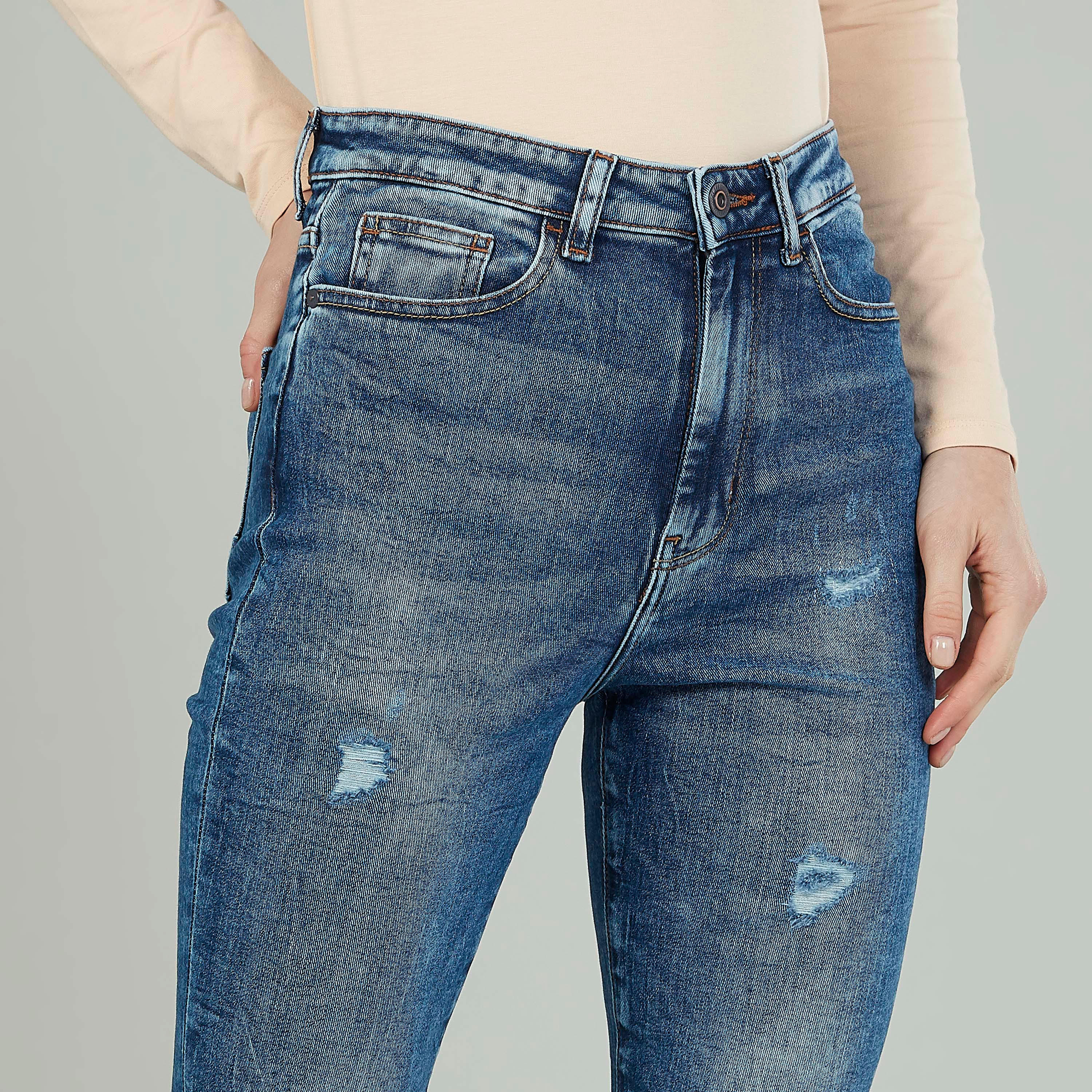 بنطلون جينز سكيني ممزّق بخصر متوسط الارتفاع وتفاصيل جيوب من لي كوبر-women-clothing-bottoms-jeans-image-3