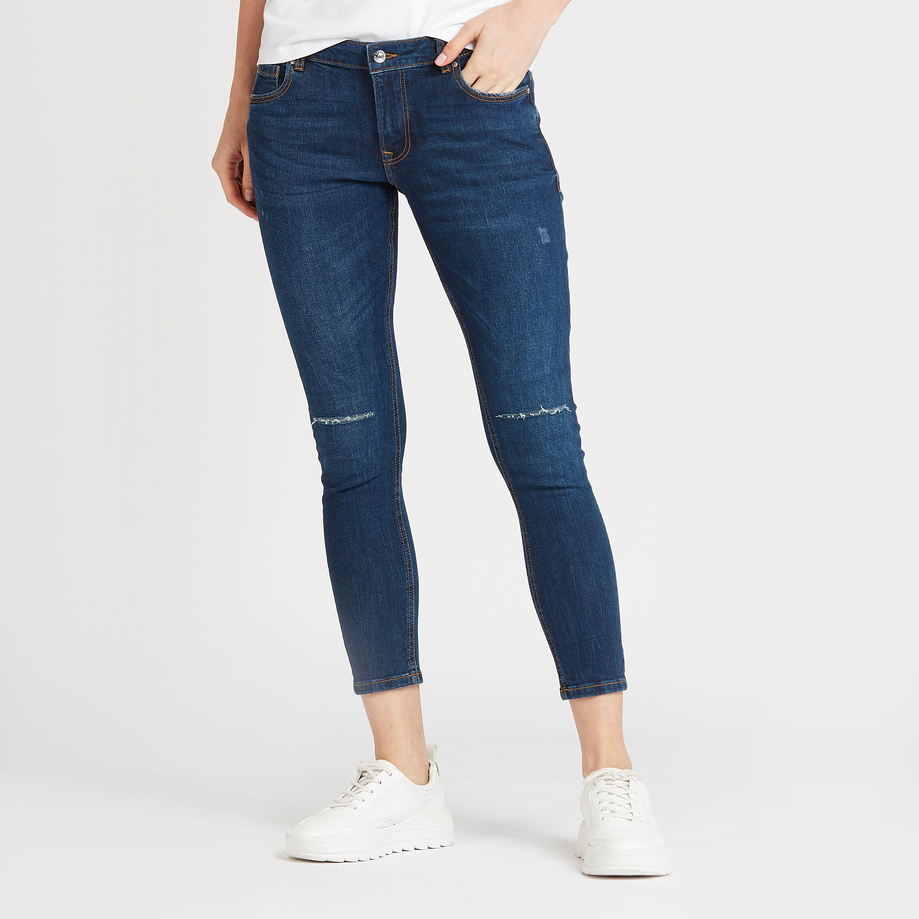 بنطلون جينز سكيني ممزّق بخصر متوسط الارتفاع وتفاصيل جيوب من لي كوبر-women-clothing-bottoms-jeans-image-1