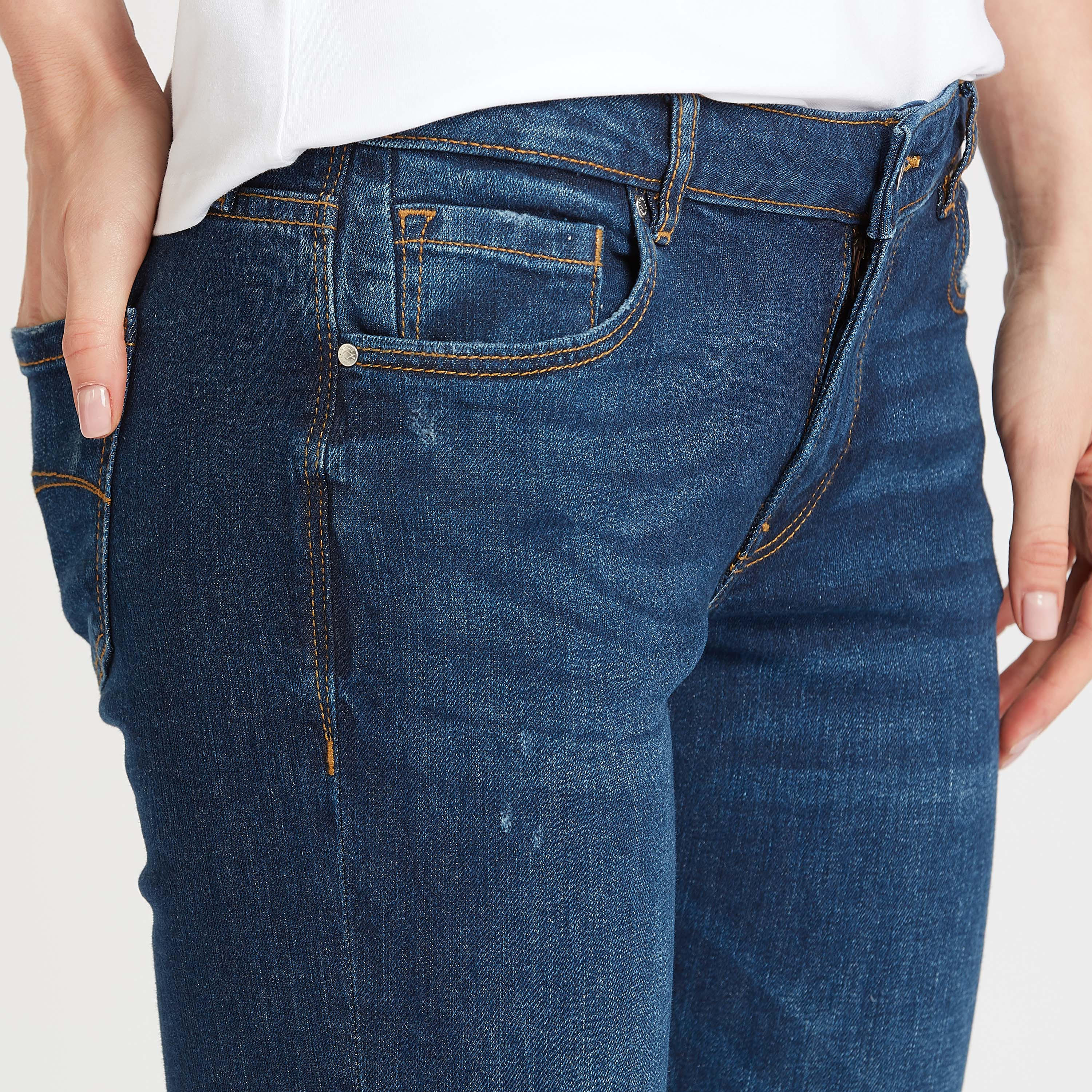 بنطلون جينز سكيني ممزّق بخصر متوسط الارتفاع وتفاصيل جيوب من لي كوبر-women-clothing-bottoms-jeans-image-6