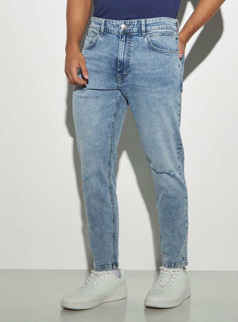 بنطلون جينز بأطراف ضيقة وقصة سكيني وزر إغلاق من لي كوبر-men-clothing-bottoms-jeans-image-1