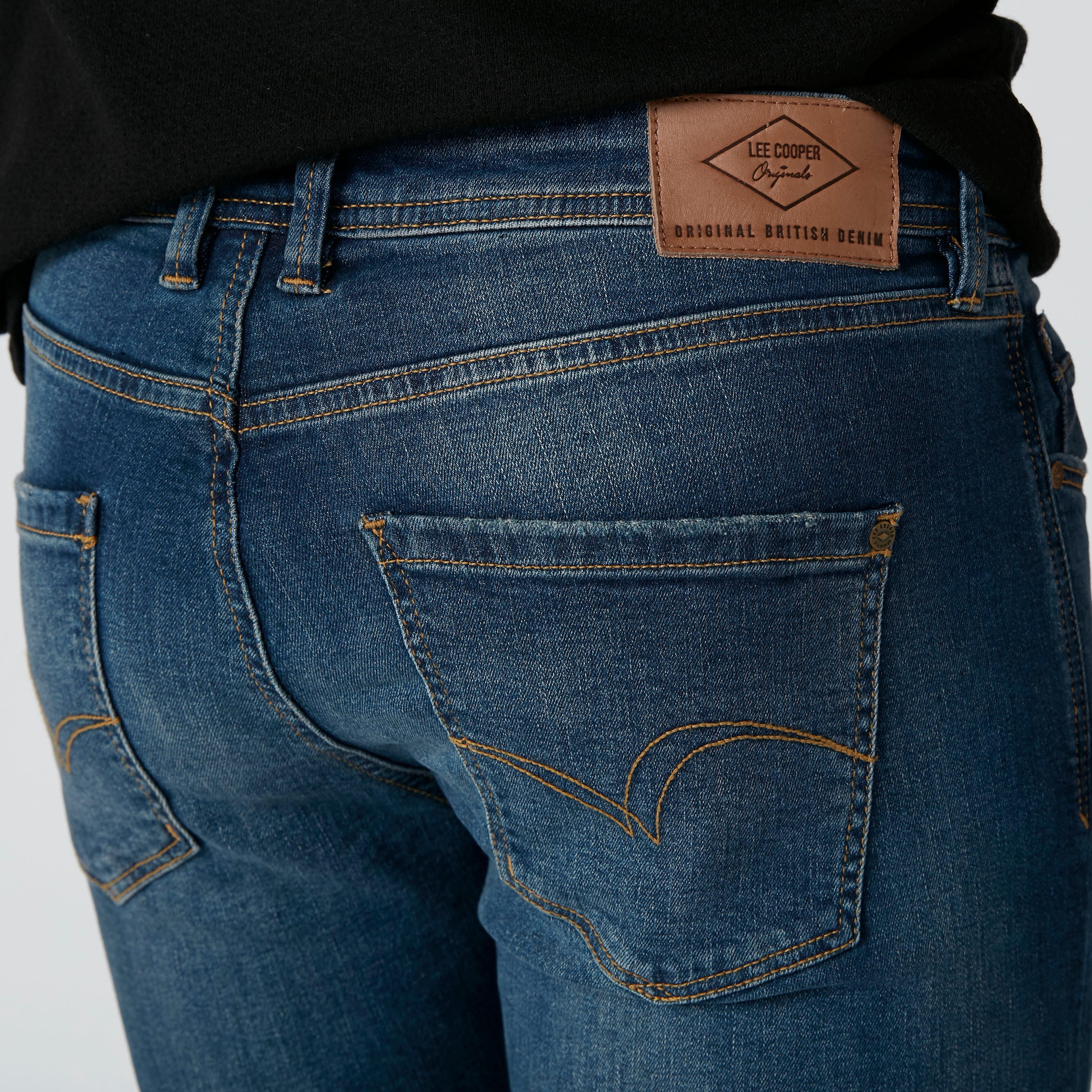 بنطال جينز بتصميم ممزق وزر إغلاق وجيوب-men-clothing-bottoms-jeans-image-5