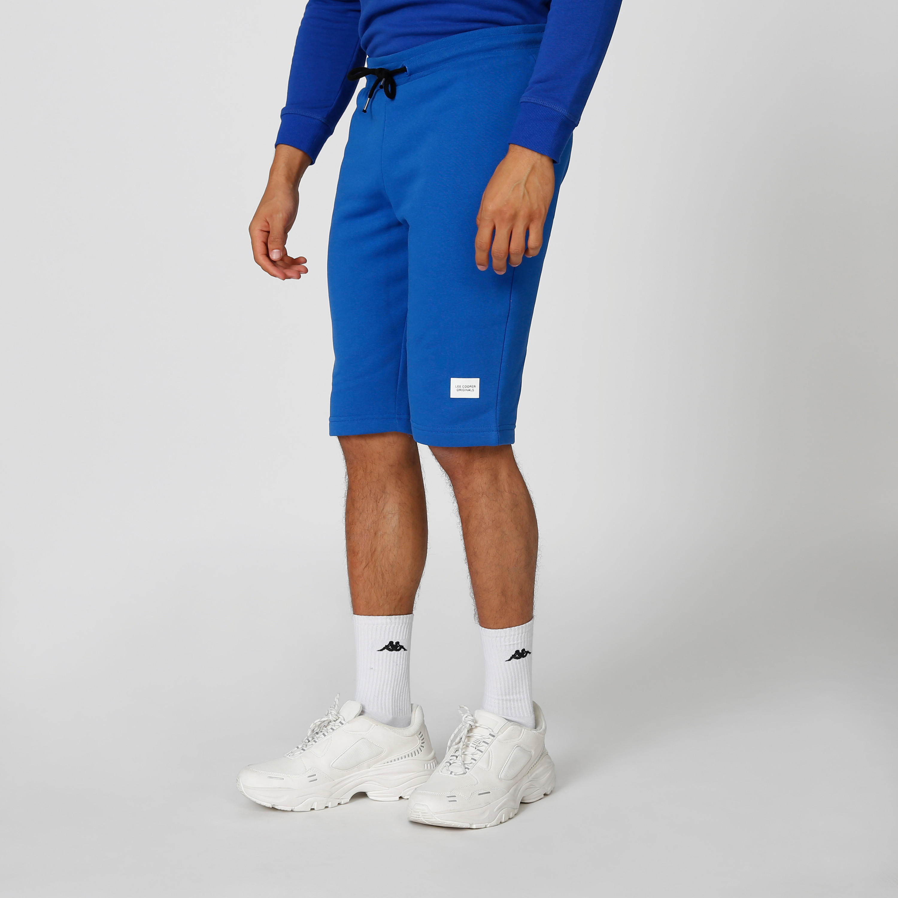 شورت مستدام سليم سادة بخصر متوسط الارتفاع وجيوب -men-clothing-bottoms-shorts-image-3