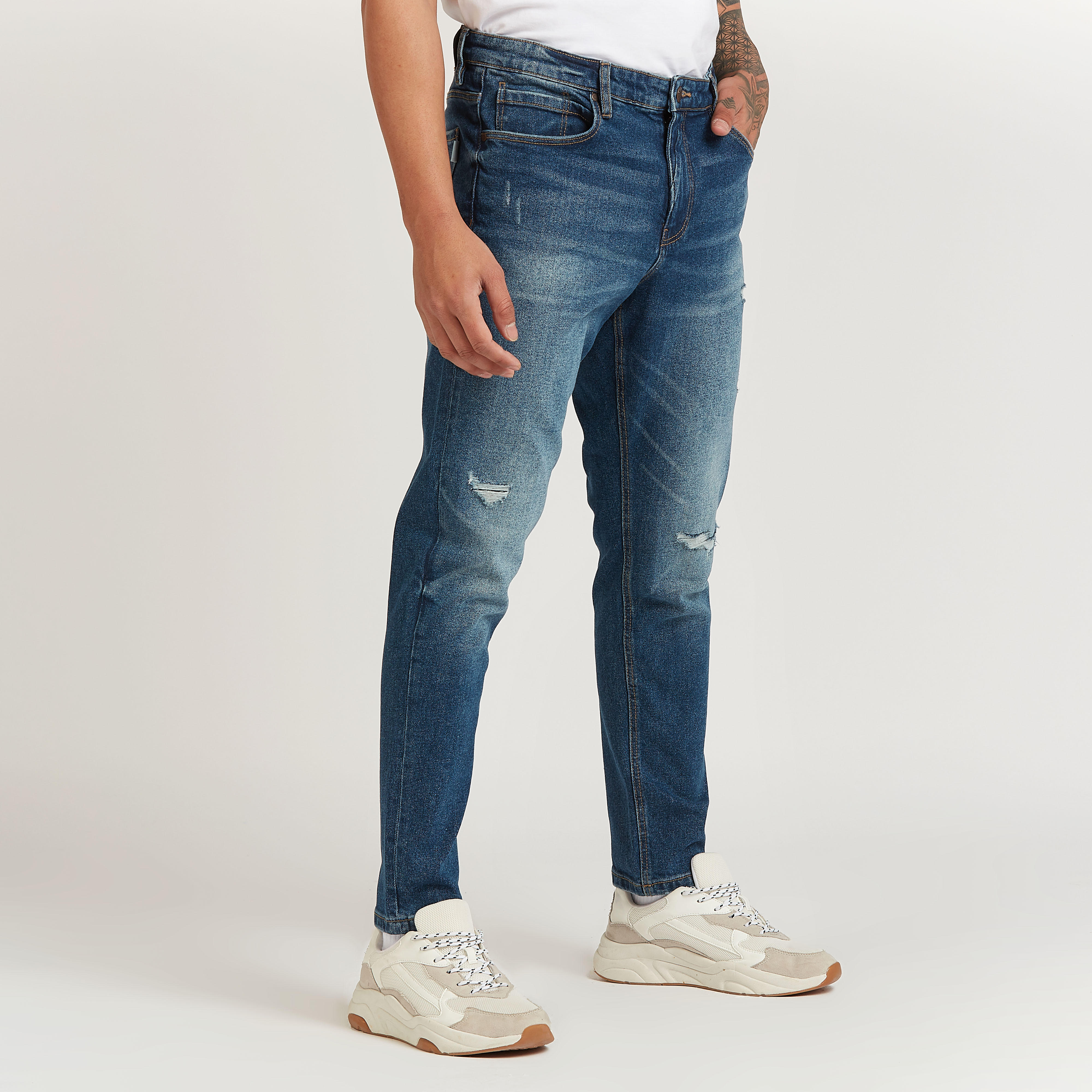 بنطلون جينز ممزق سكيني بخصر متوسط الارتفاع بجيوب من لي كوبر-men-clothing-bottoms-jeans-image-1