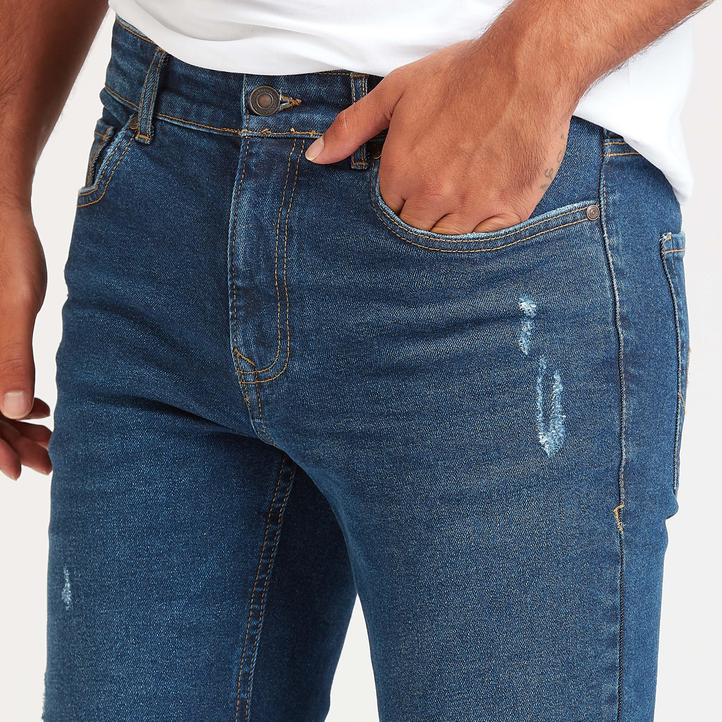 بنطلون جينز سليم فيت ممزق بخصر متوسط الإرتفاع وتفاصيل جيوب من لي كوبر-men-clothing-bottoms-jeans-image-3