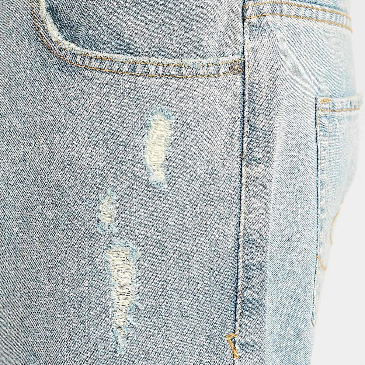 بنطلون جينز دنيم ممزّق بقصّة مريحة وخصر متوسّط الارتفاع من لي كوبر-men-clothing-bottoms-jeans-image-1